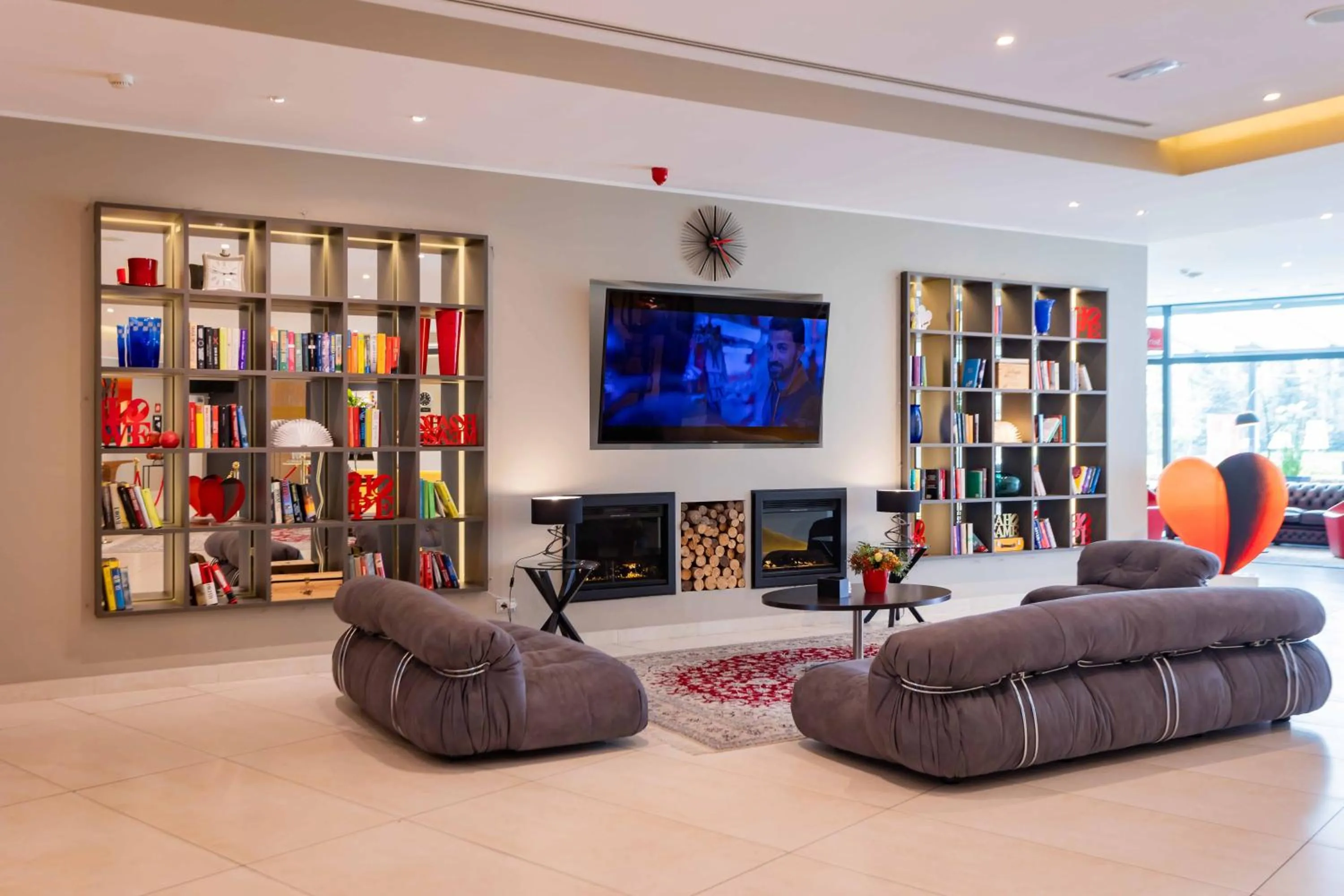 Communal lounge/ TV room in ibis Styles Milano Est Settala