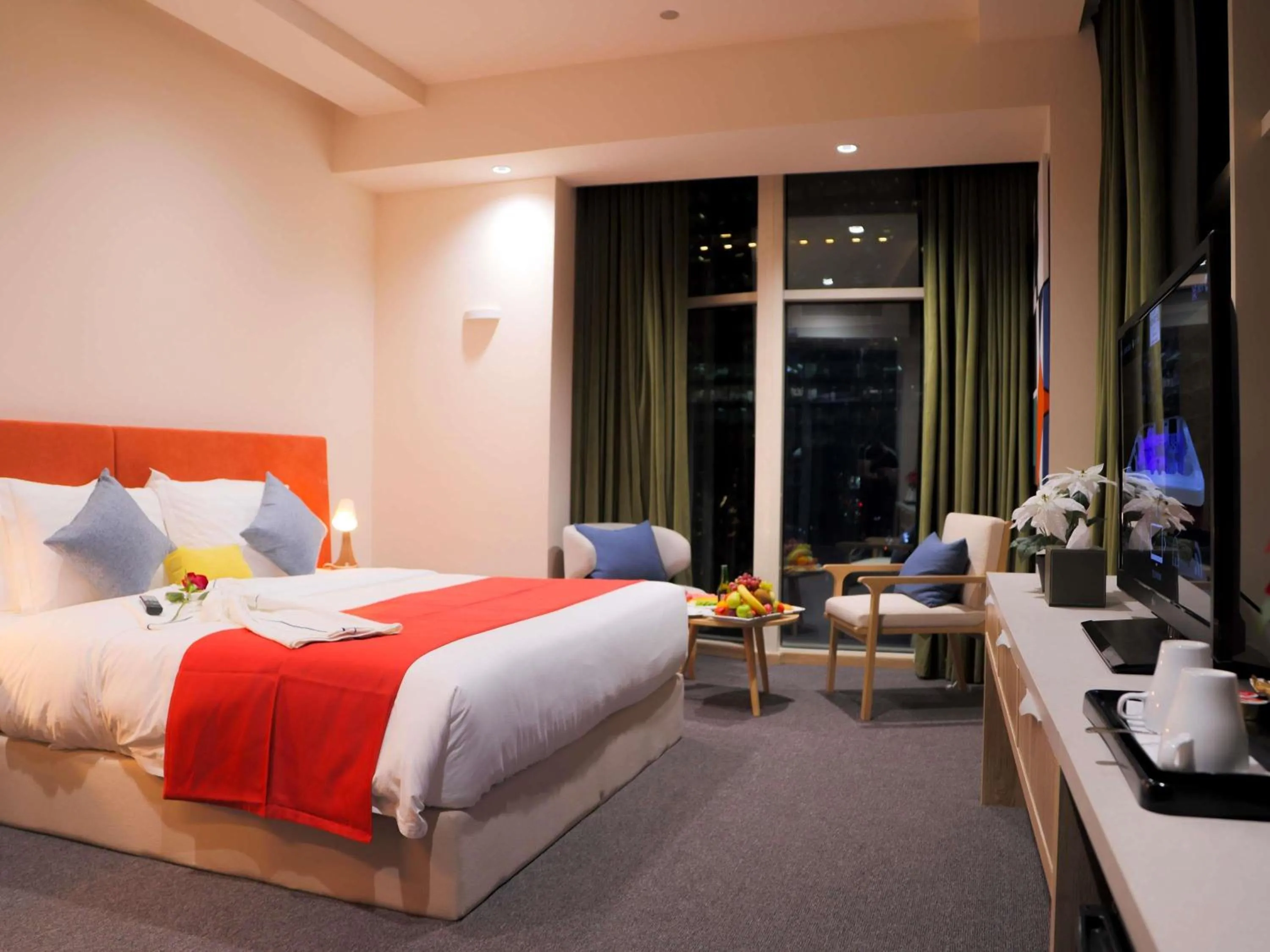 Bedroom in Novotel Suites Riyadh Centre