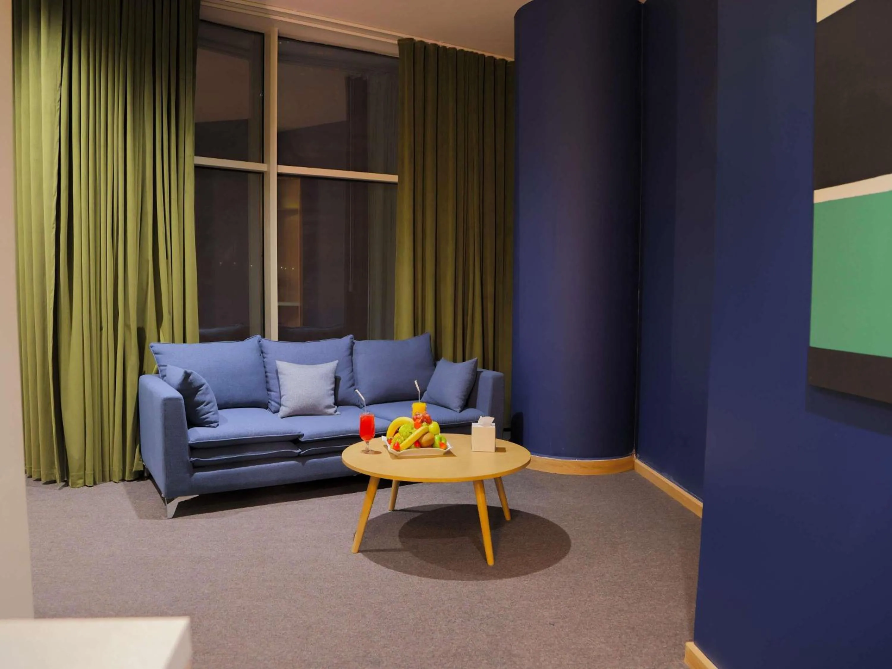 Bedroom in Novotel Suites Riyadh Centre