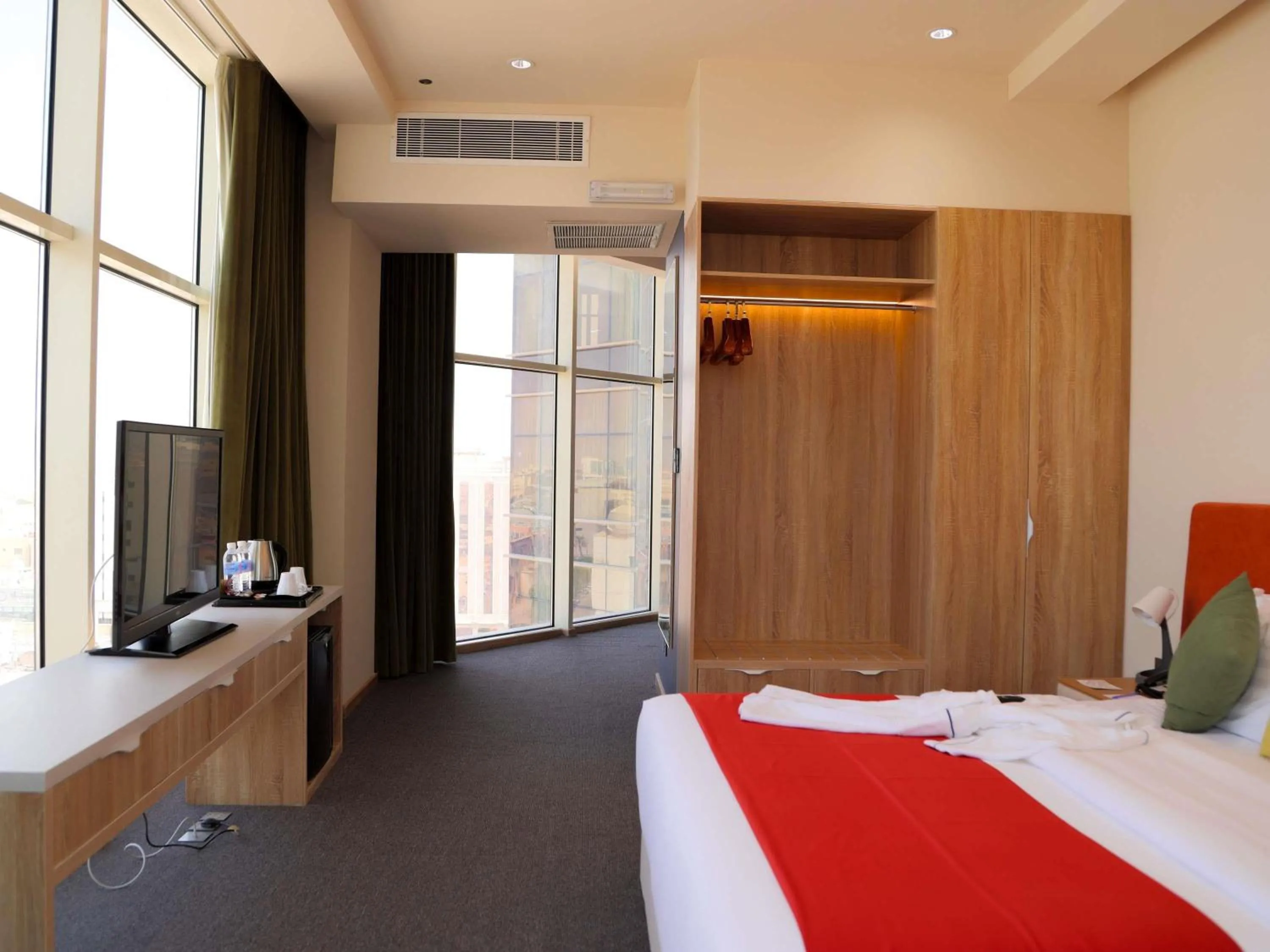 Bedroom in Novotel Suites Riyadh Centre