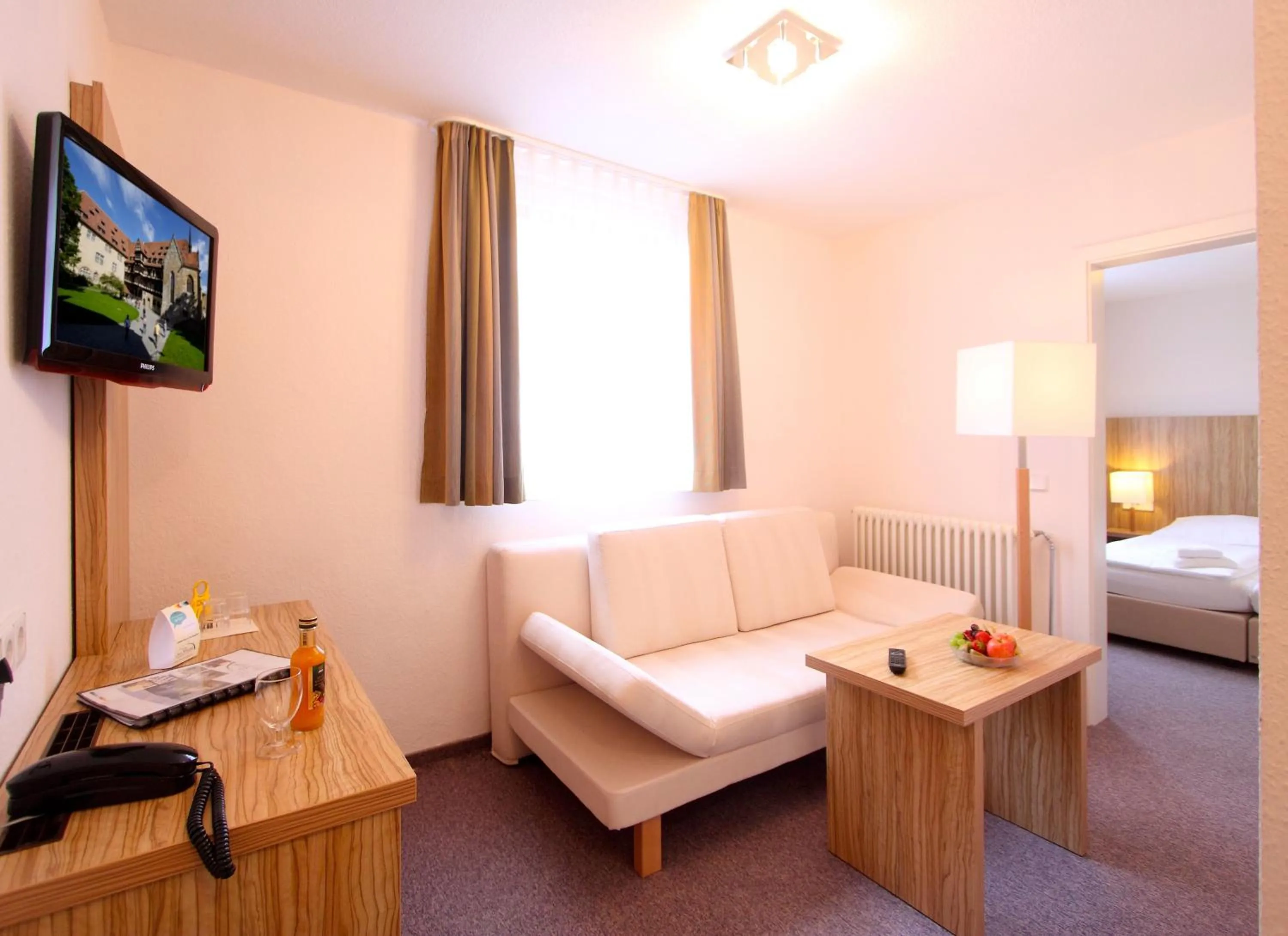 Seating area, Bed in Akzent Hotel Am Burgholz