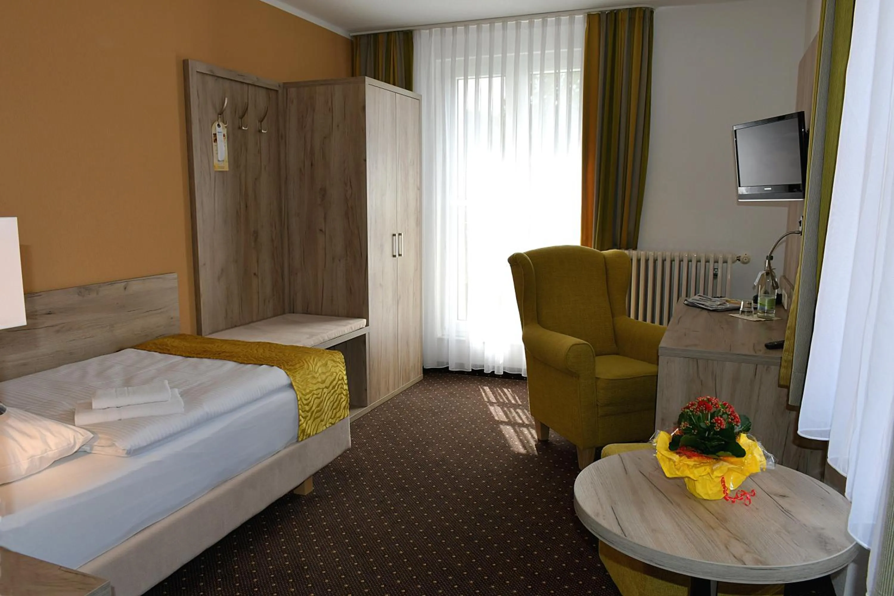 Photo of the whole room, Bed in Akzent Hotel Am Burgholz