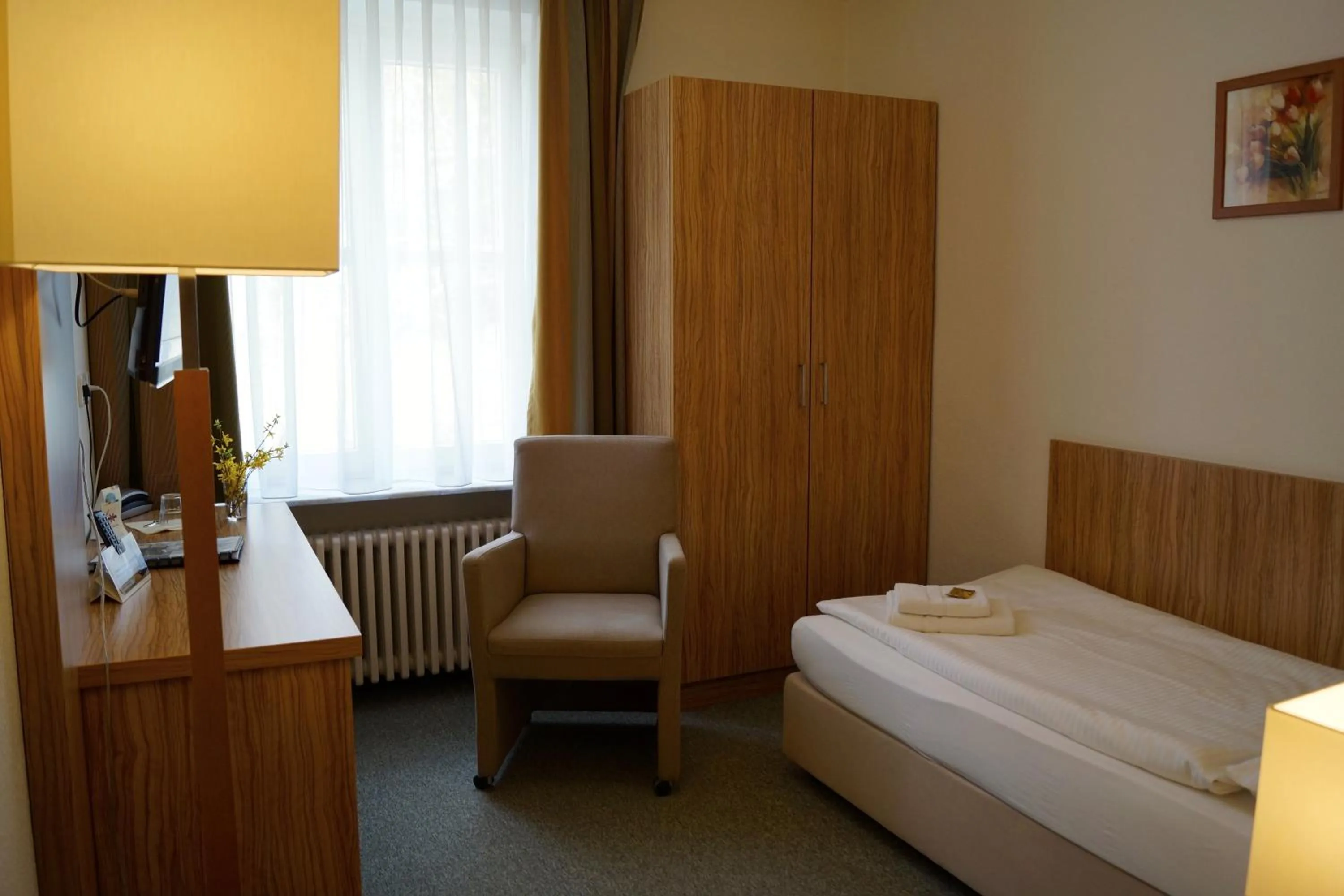 Photo of the whole room, Bed in Akzent Hotel Am Burgholz