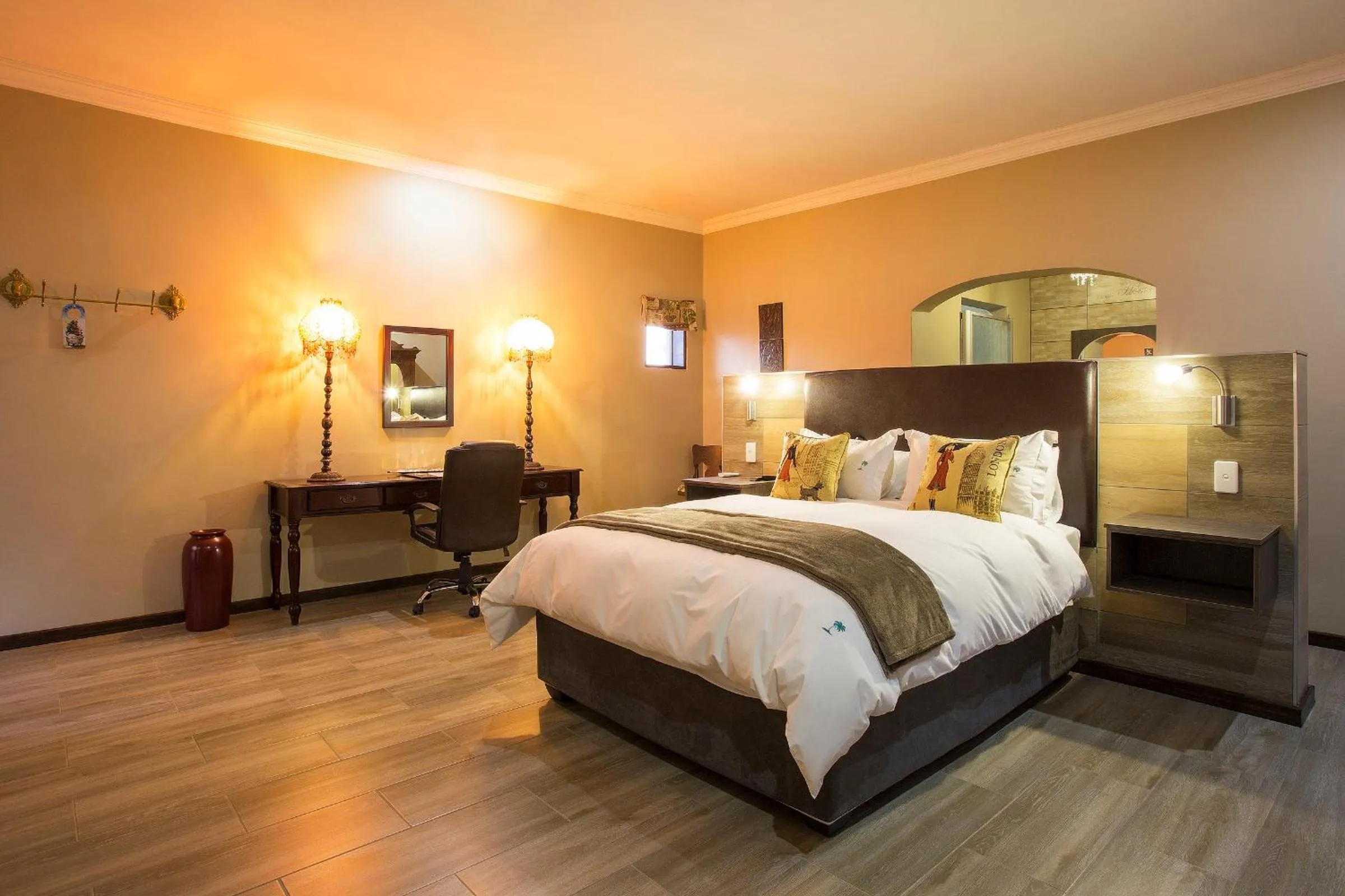 Bed in The Royal Palm B&B