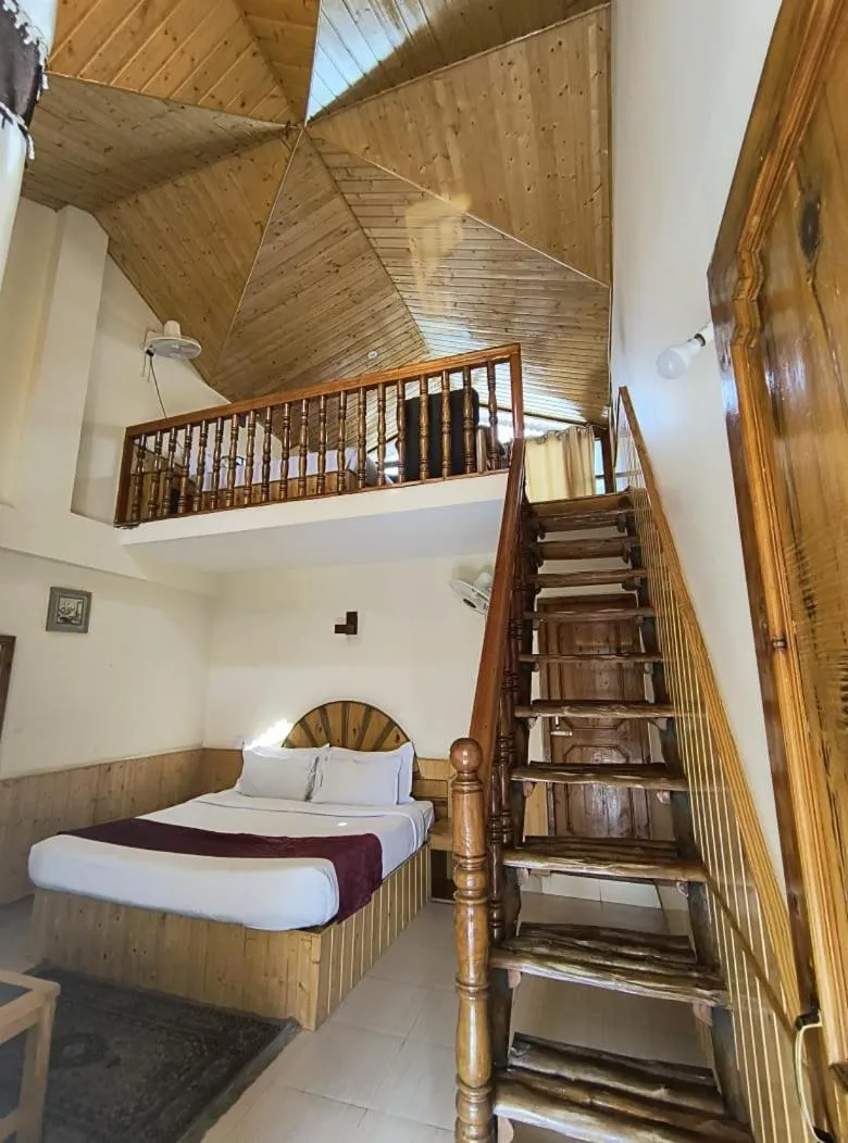 Bed in Hotel Purnima - A Riverside Hotel in Kasol