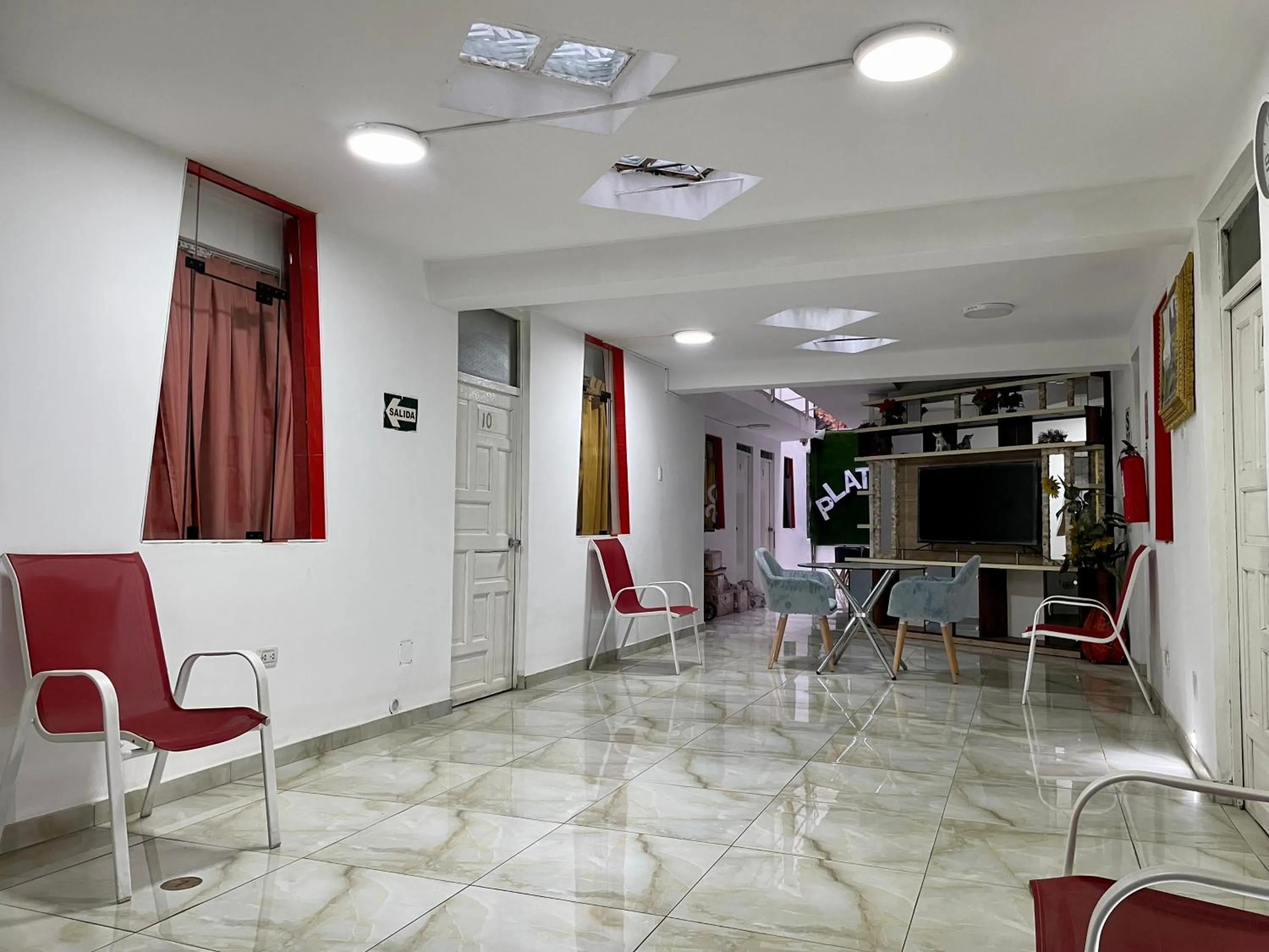 Communal lounge/ TV room in Hotel Plateros