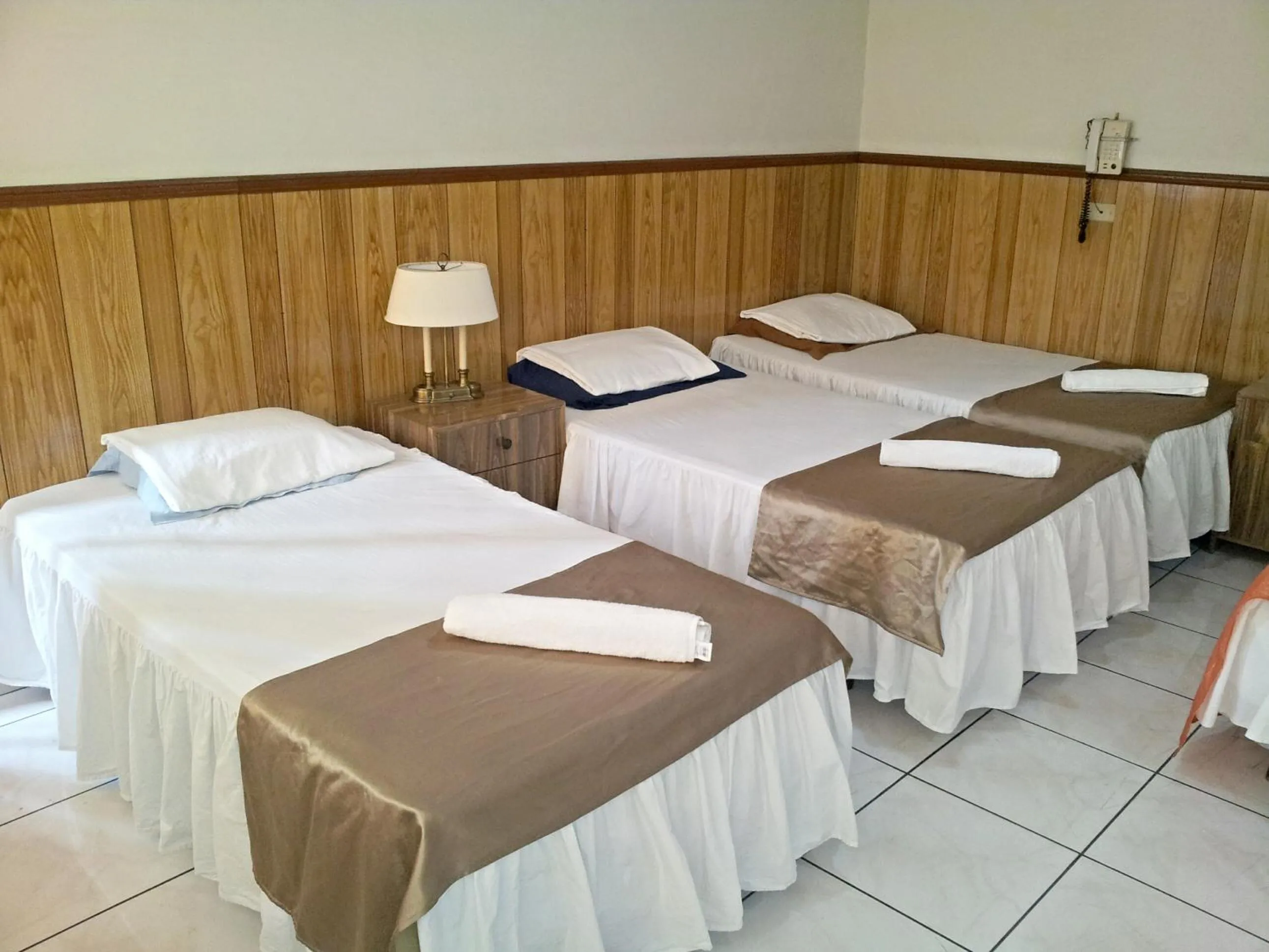Photo of the whole room, Bed in Hotel Manantiales El Salvador
