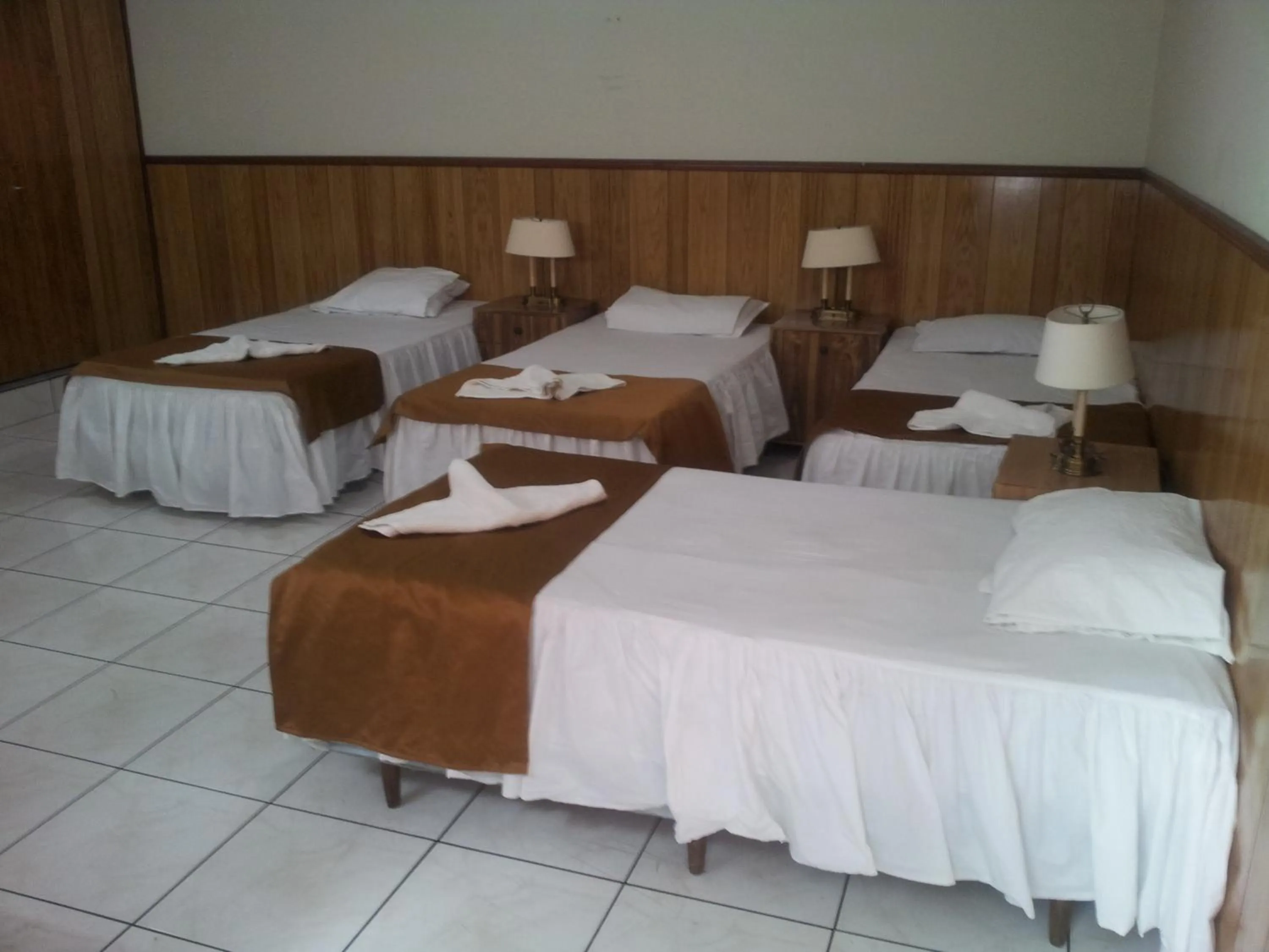 Photo of the whole room, Bed in Hotel Manantiales El Salvador