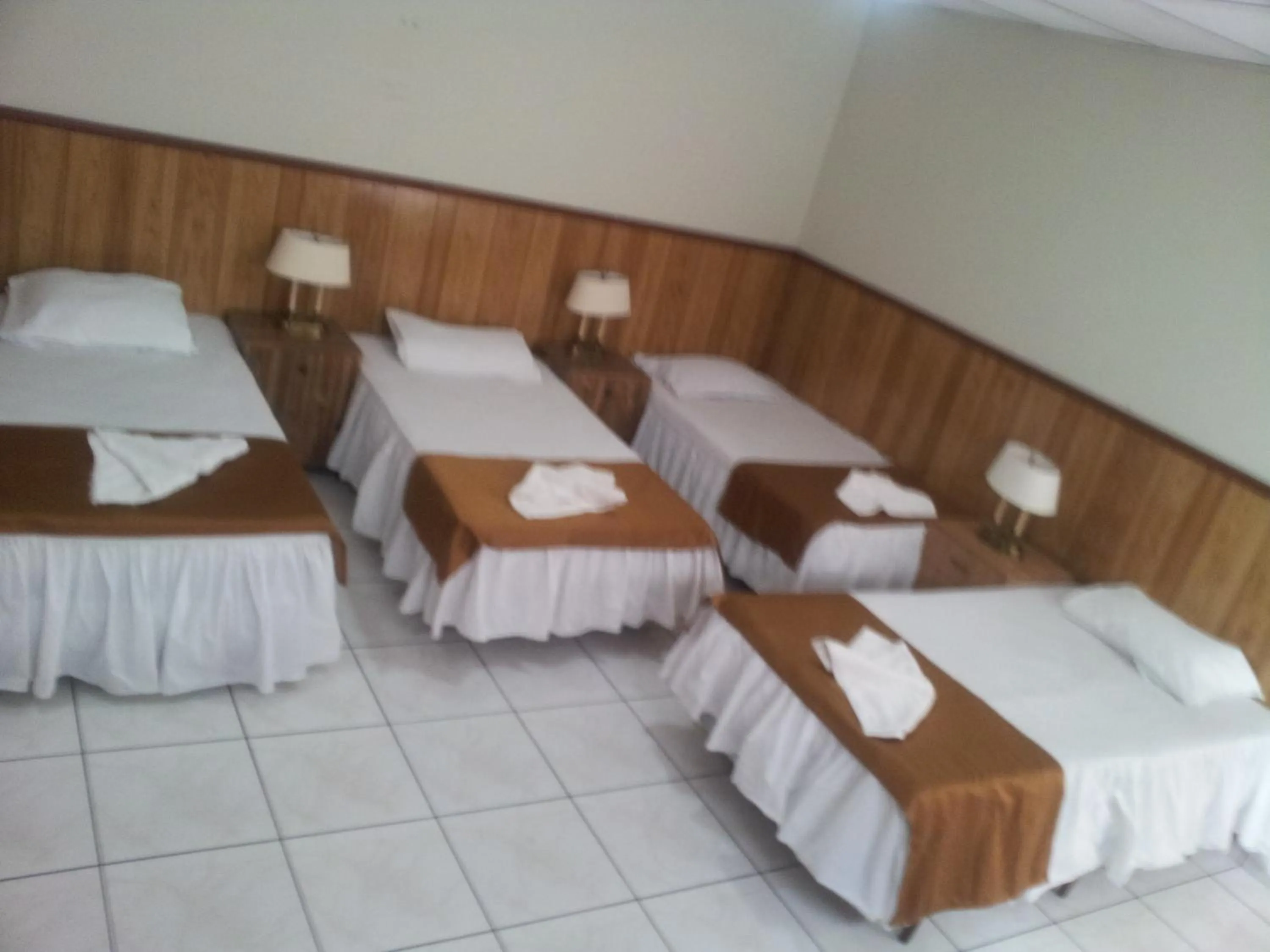 Photo of the whole room, Bed in Hotel Manantiales El Salvador