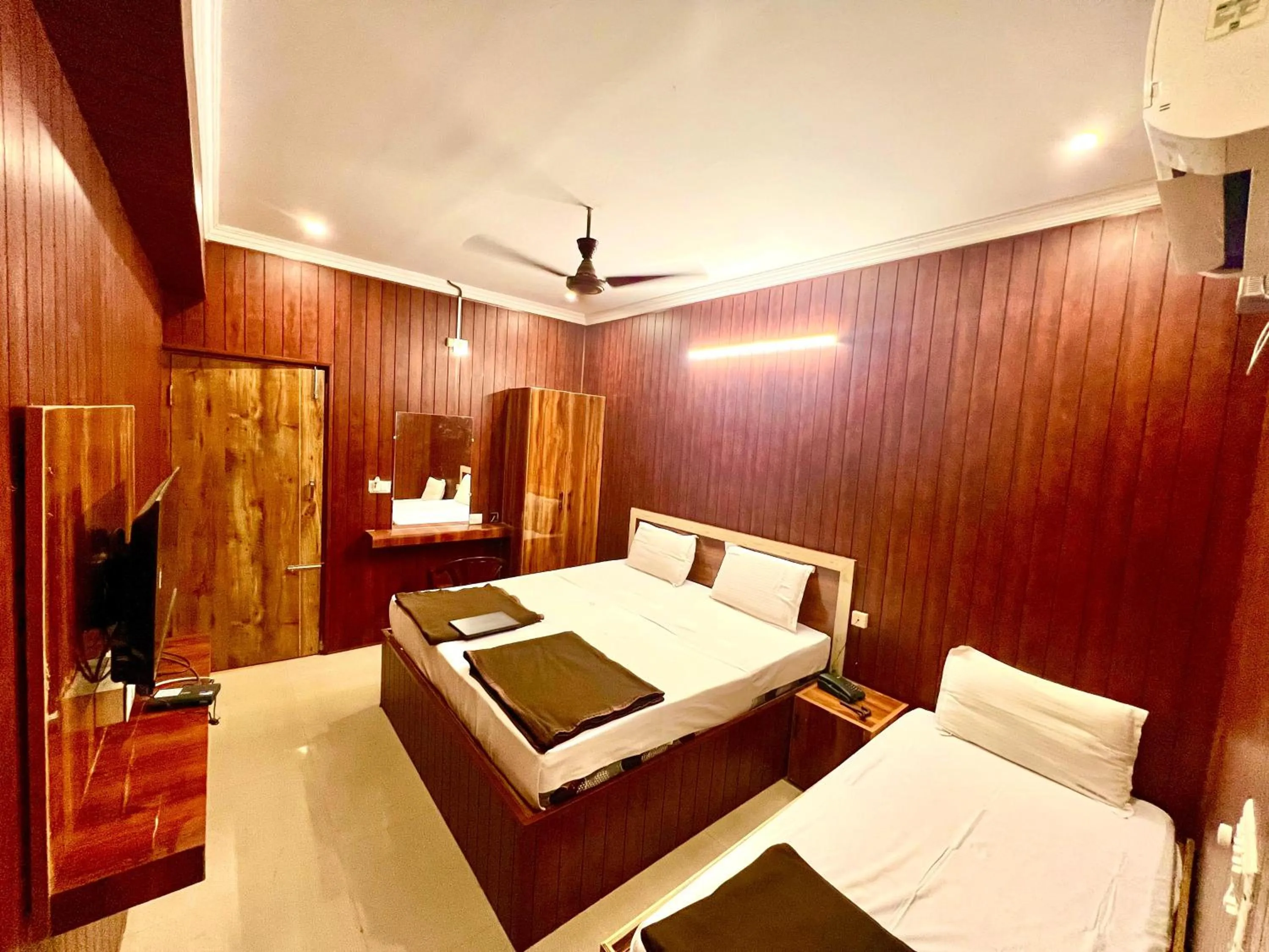 Bed in Hotel Govindh Heights