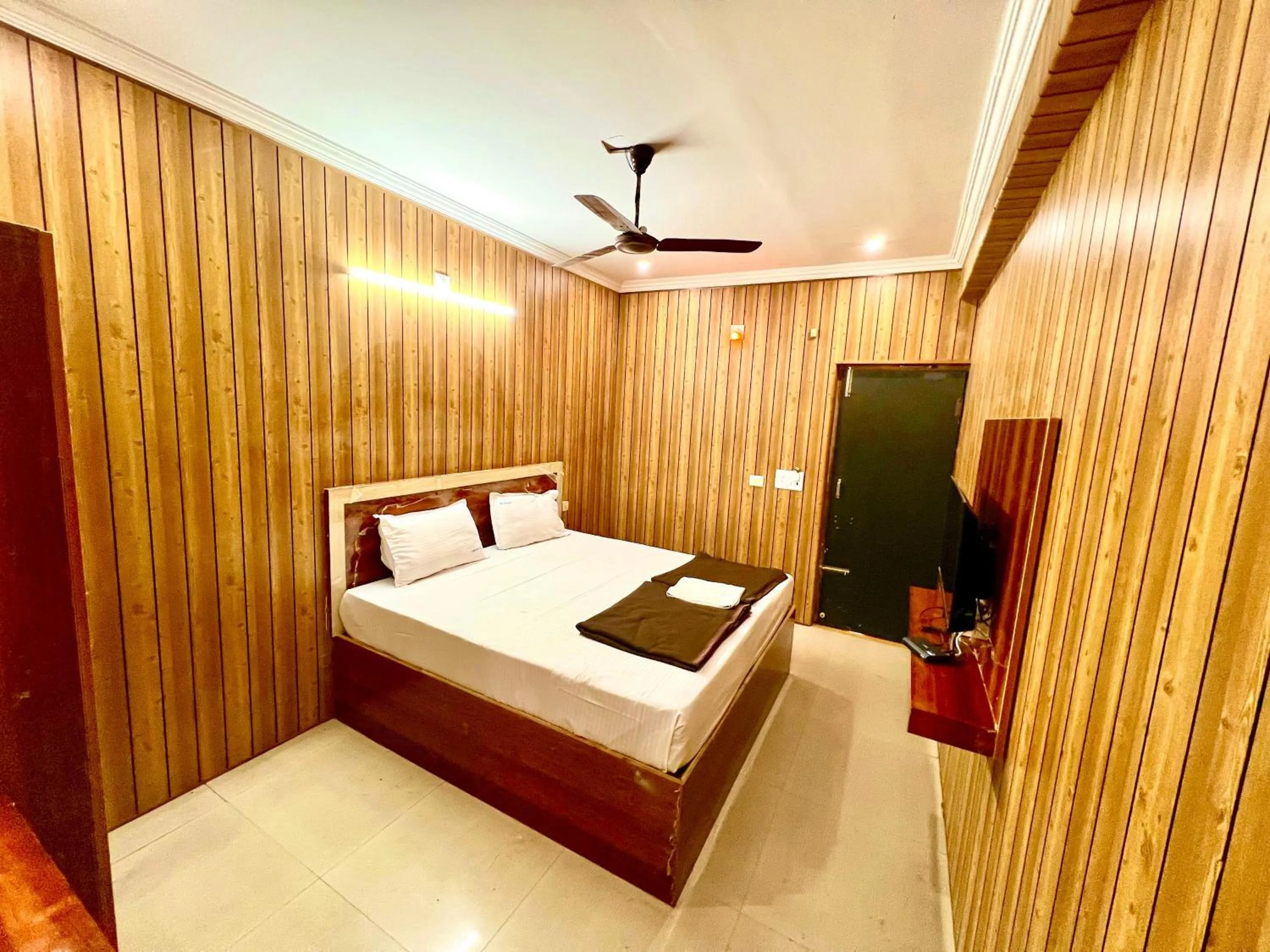 Bed in Hotel Govindh Heights