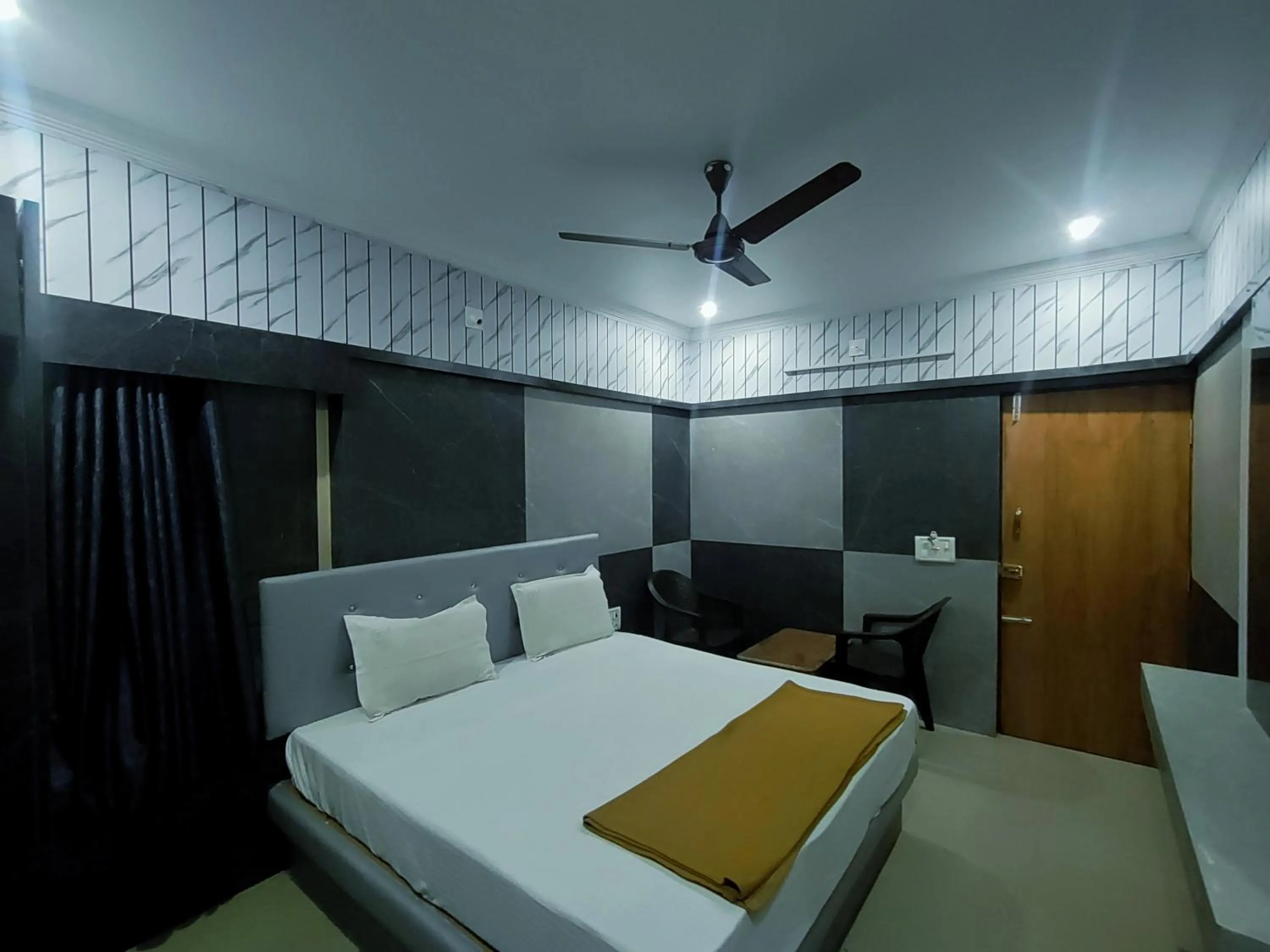 Bed in Hotel Govindh Heights