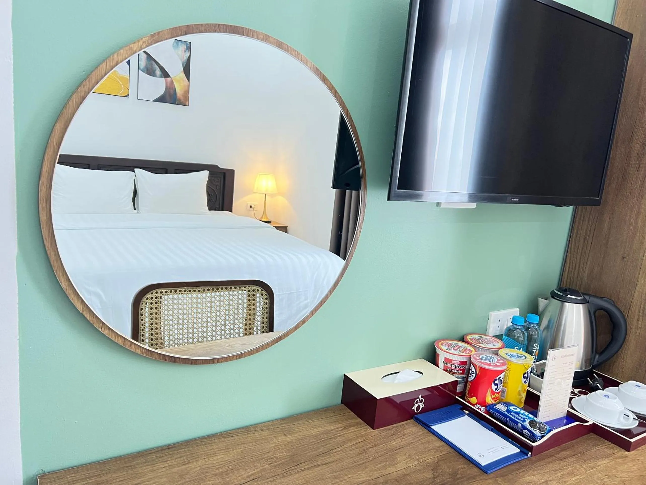 Seating area, Bed in ORCHID Hotel