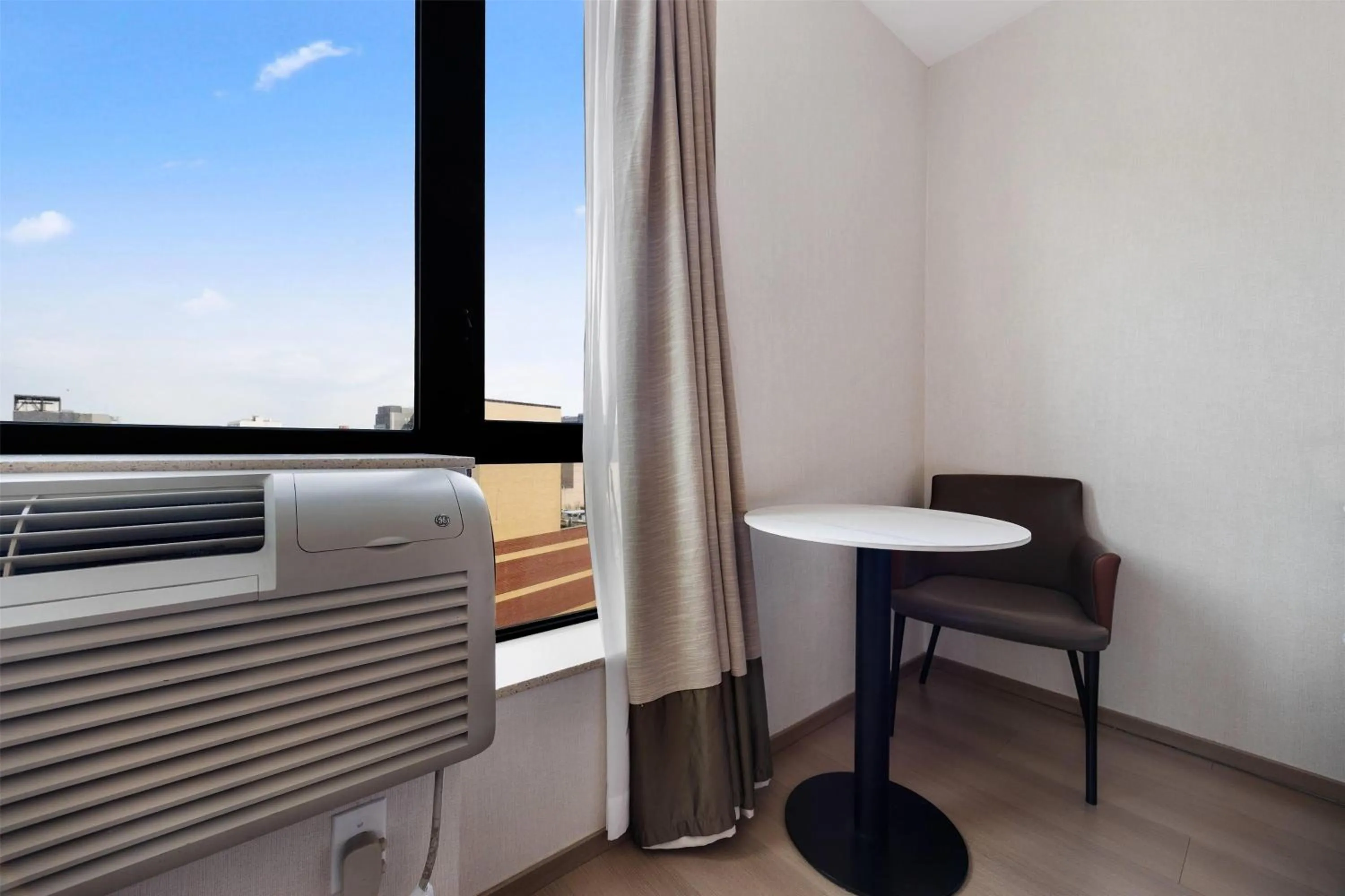 Photo of the whole room in Ramada by Wyndham Flushing Queens