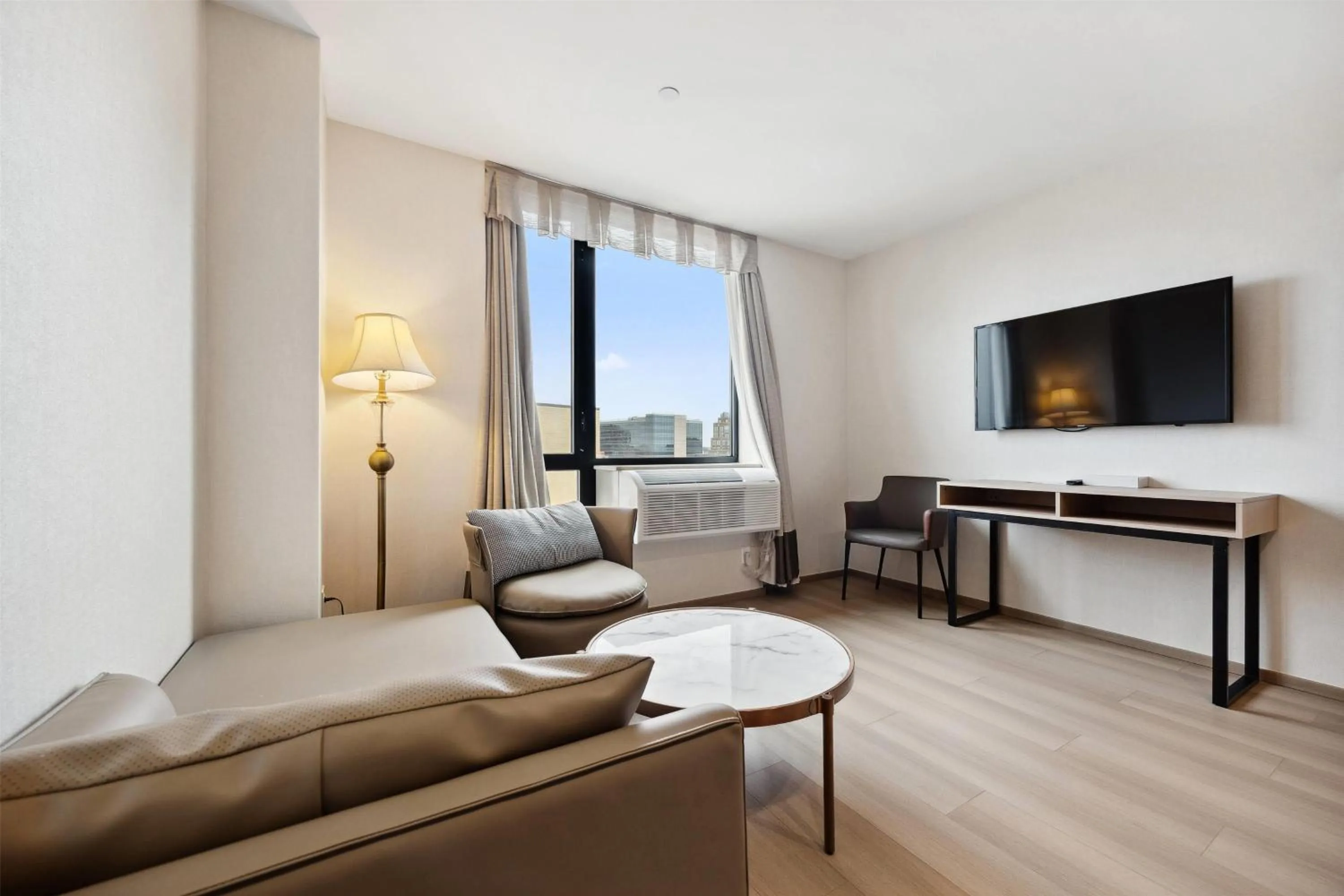 Photo of the whole room in Ramada by Wyndham Flushing Queens