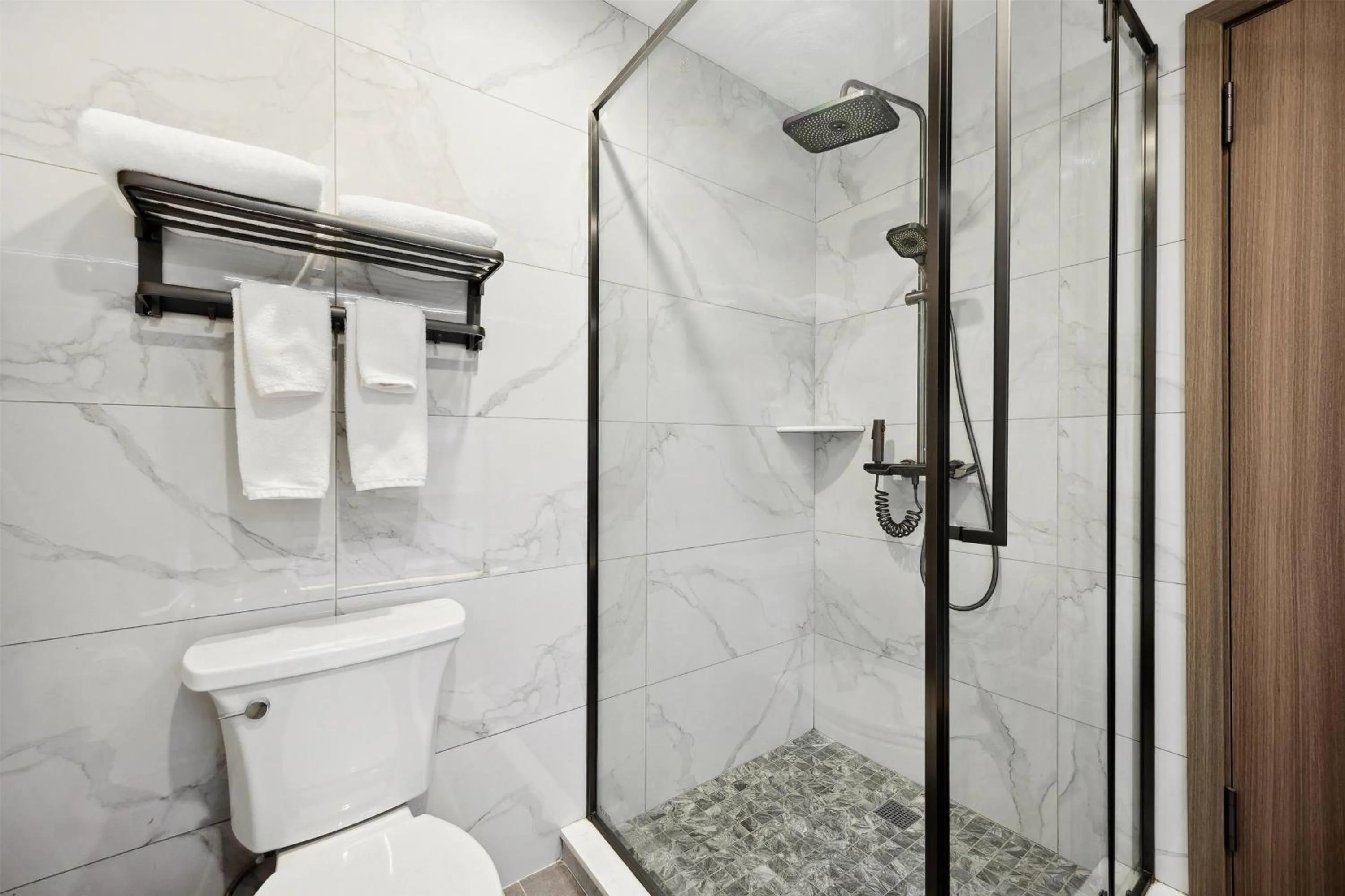 Bathroom in Ramada by Wyndham Flushing Queens