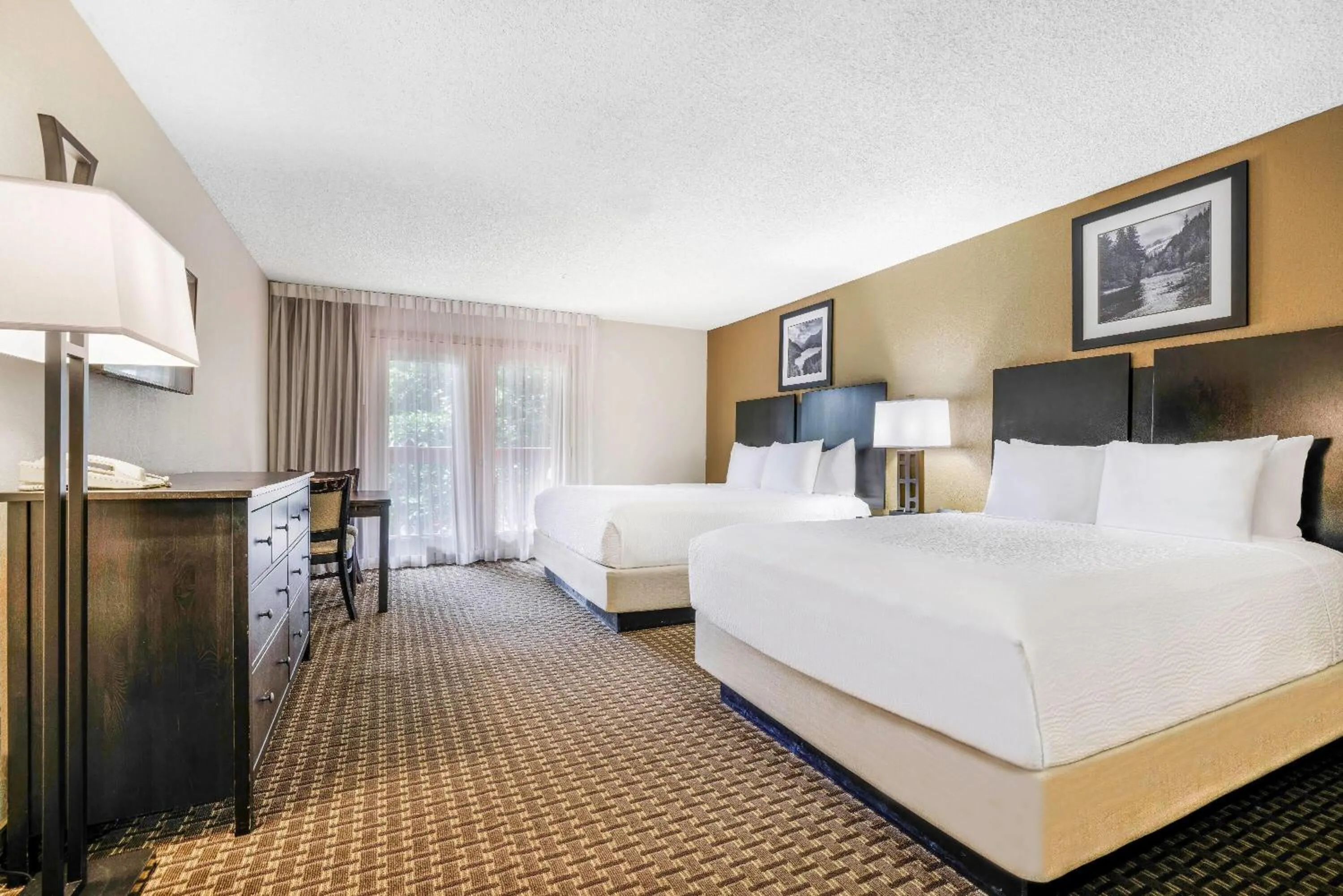 Photo of the whole room, Bed in Baymont by Wyndham Cortez