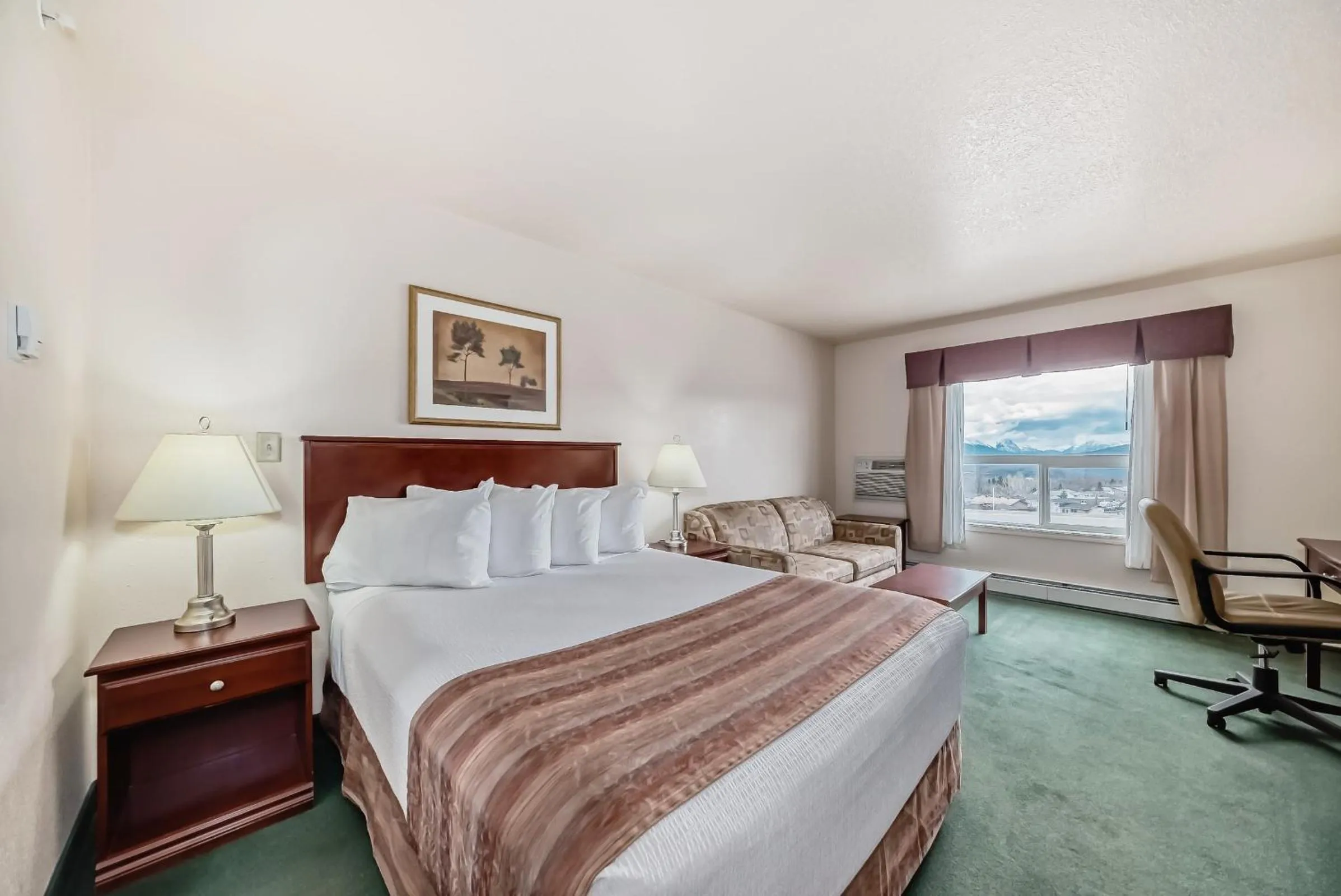 Bed in Grande Cache Inn & Suites