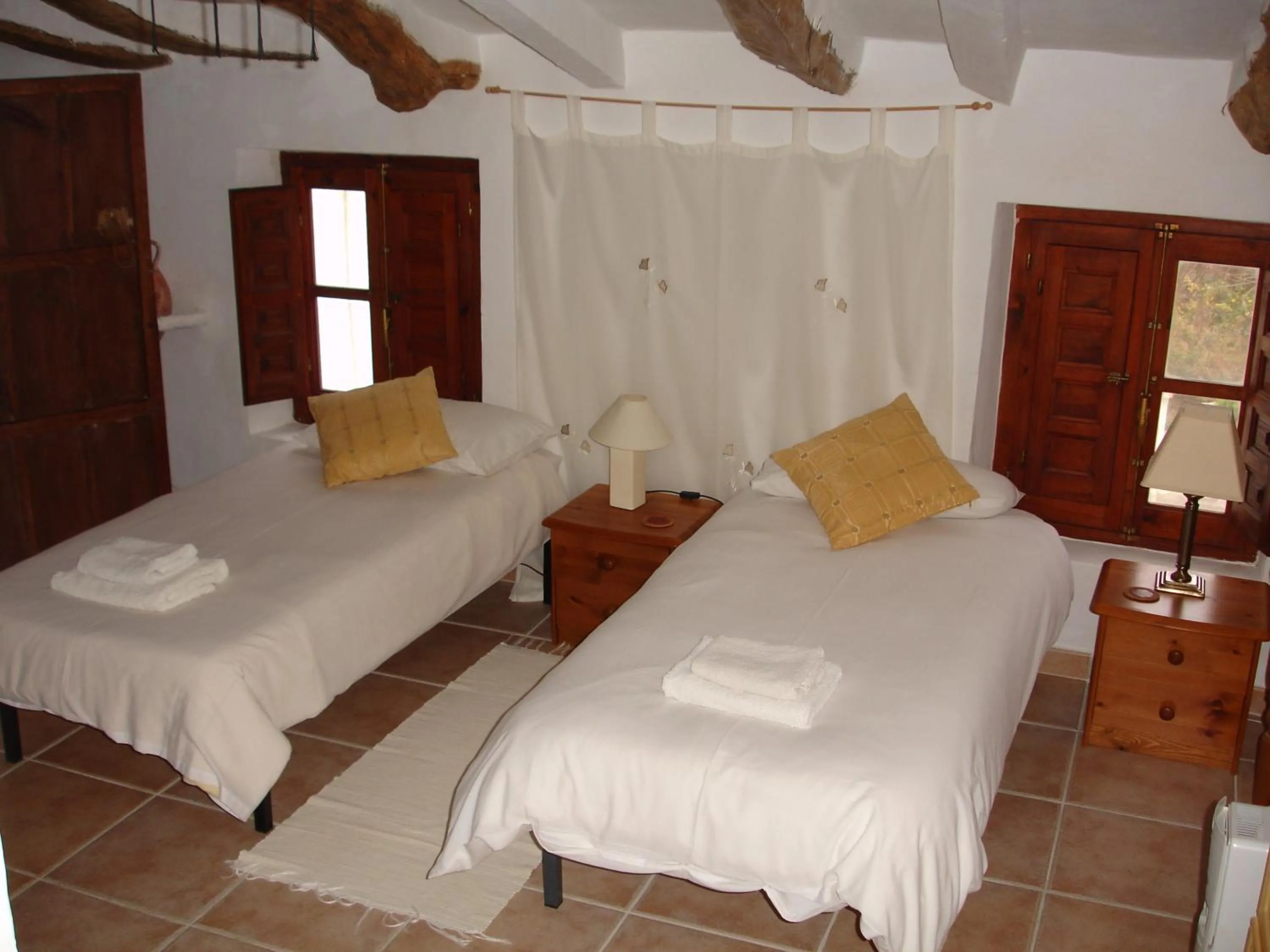 Bed in Almond Reef Casa Rural