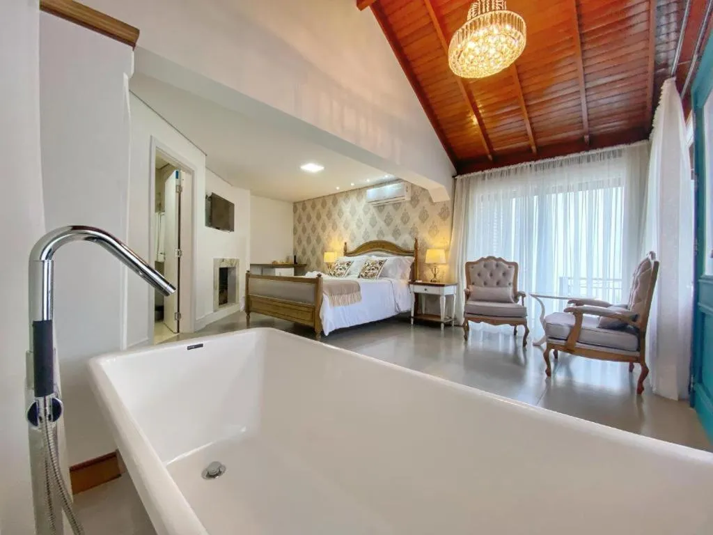 Photo of the whole room, Bed in Pousada Villa Vie