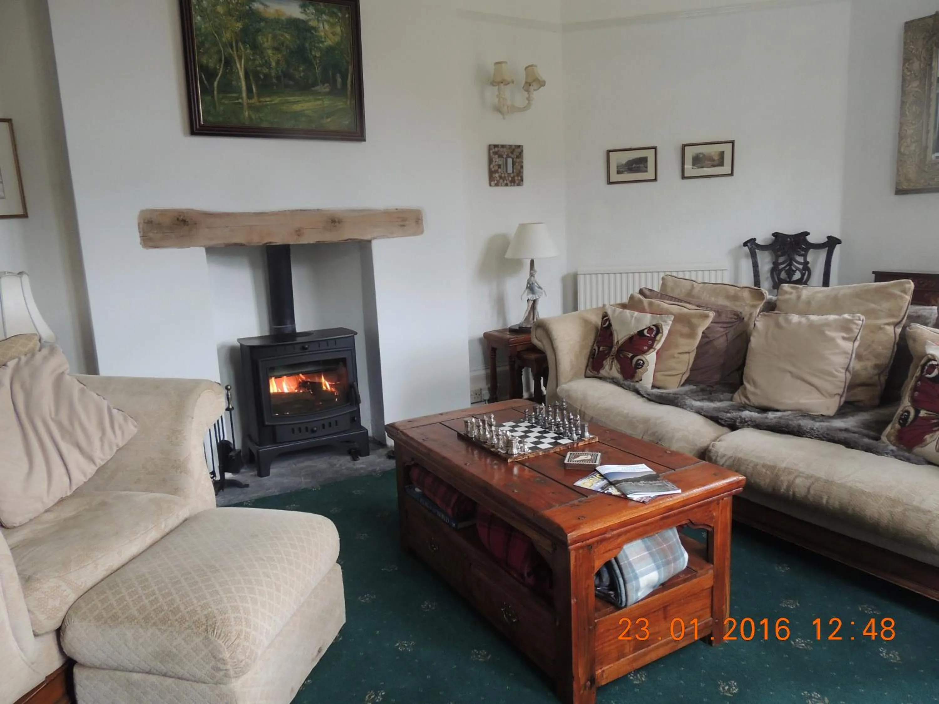 Communal lounge/ TV room in Orchard House Hotel