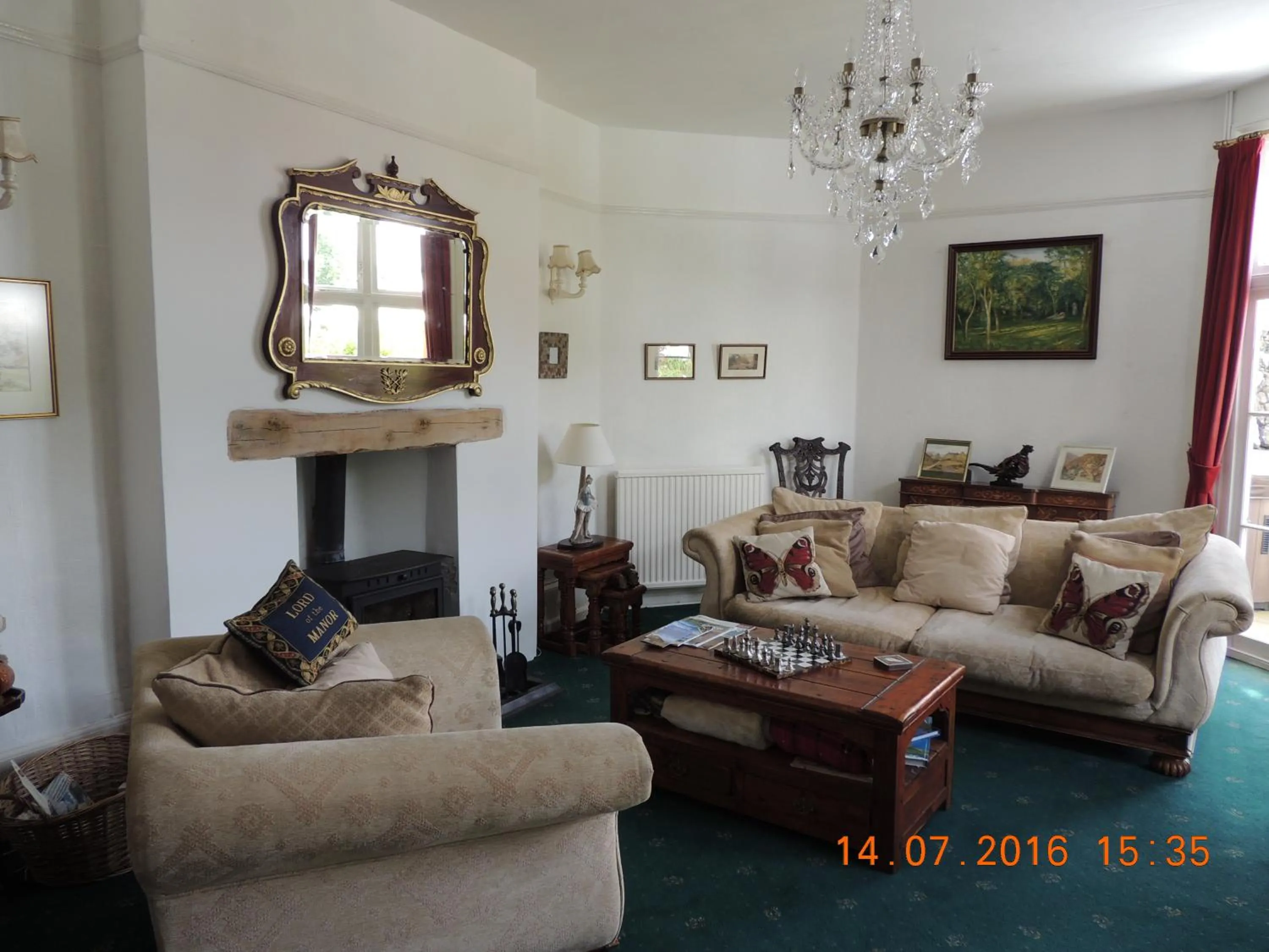 Communal lounge/ TV room in Orchard House Hotel