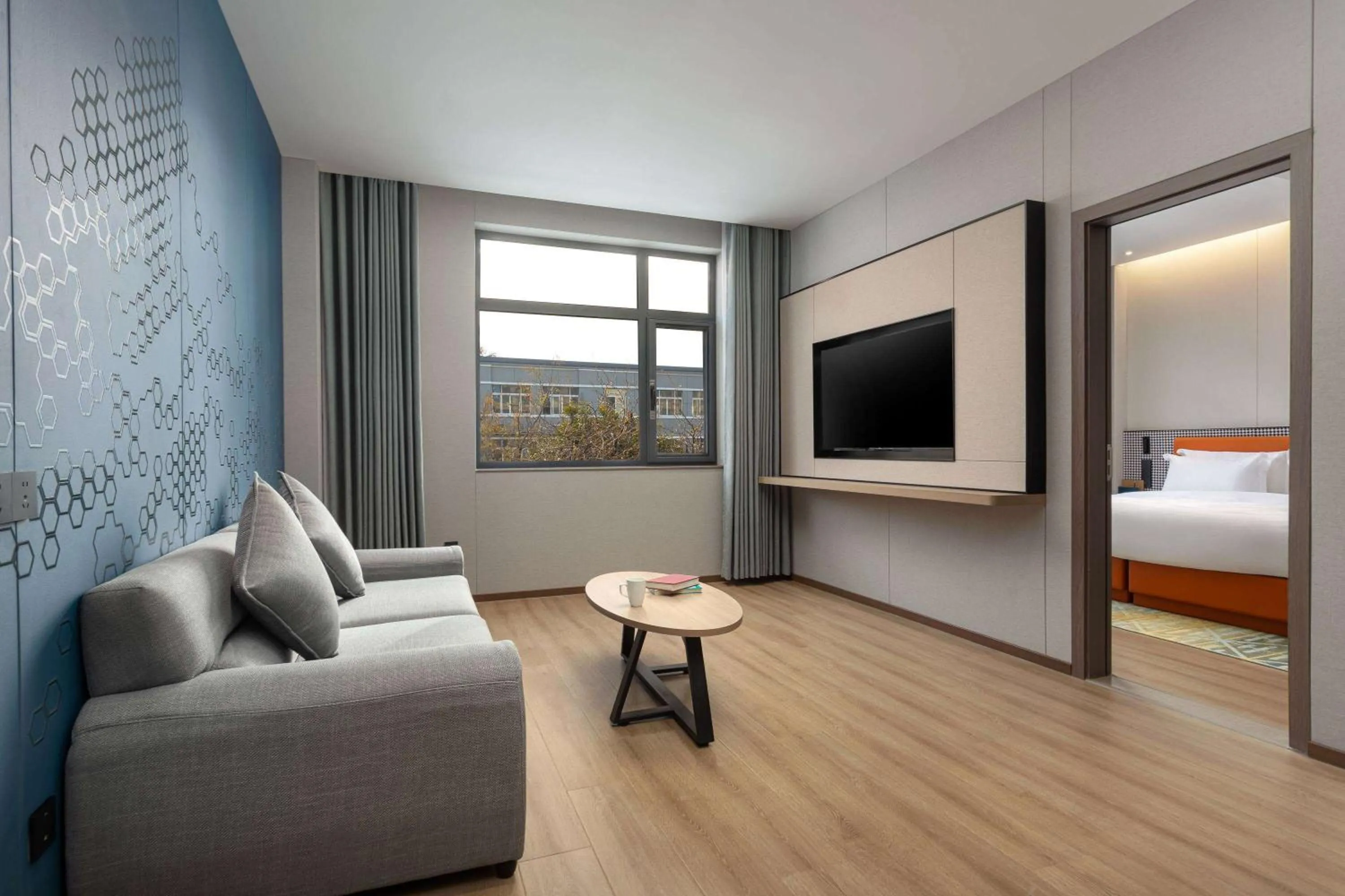 Living room, Bed in Days Inn by Wyndham Xi'an Yanliang