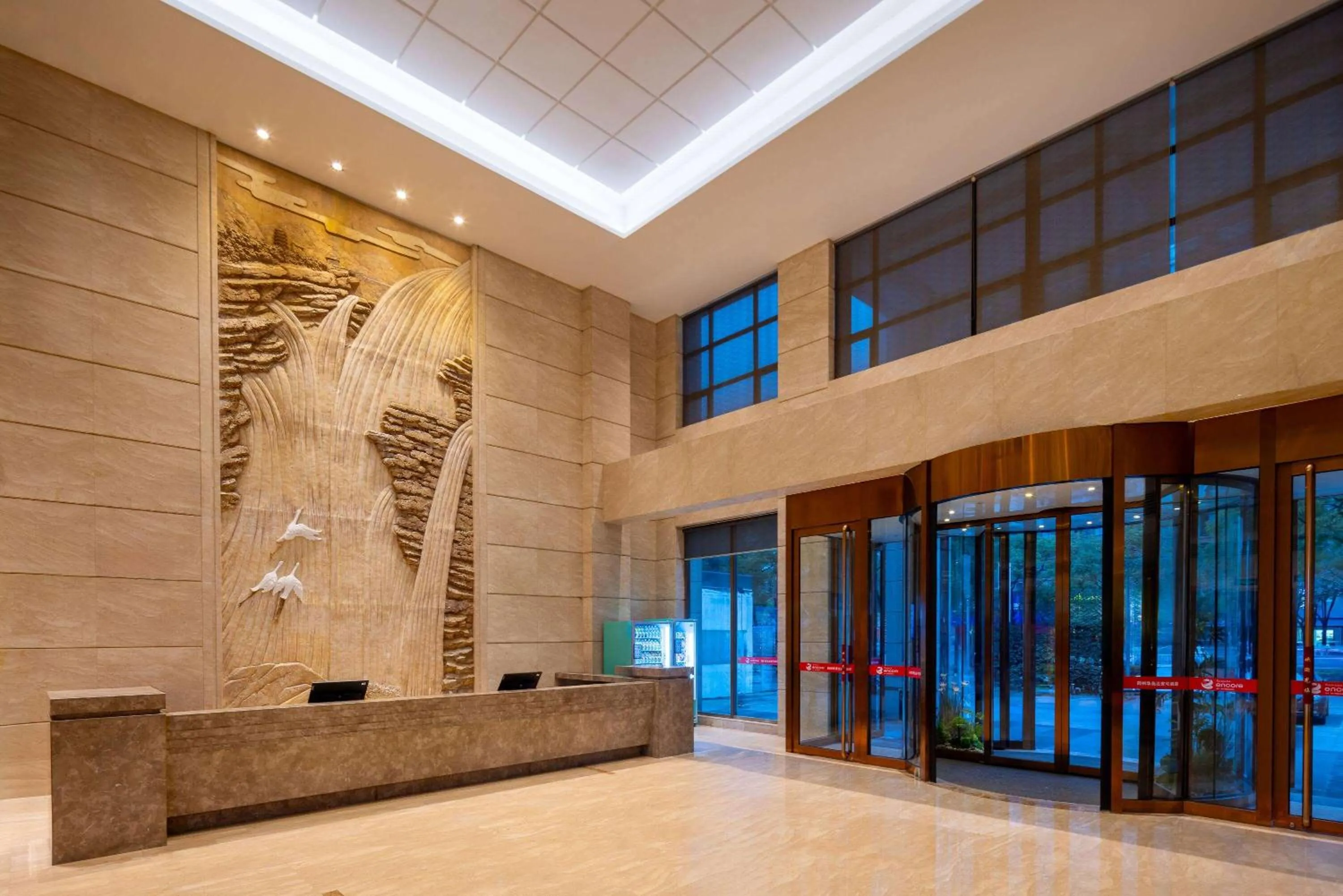 Lobby or reception in Ramada Encore by Wyndham Jingzhou Shashi