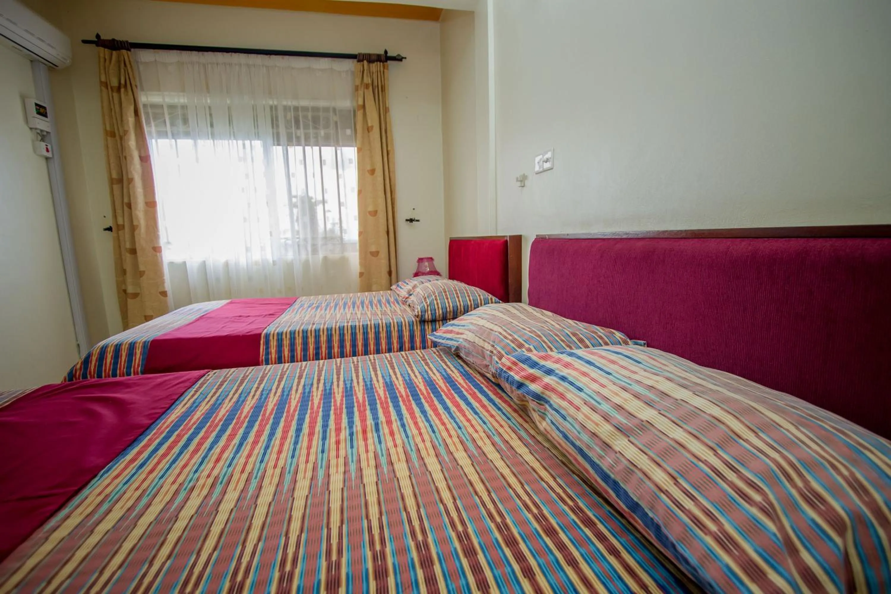 Bed in Askay Hotel Suites