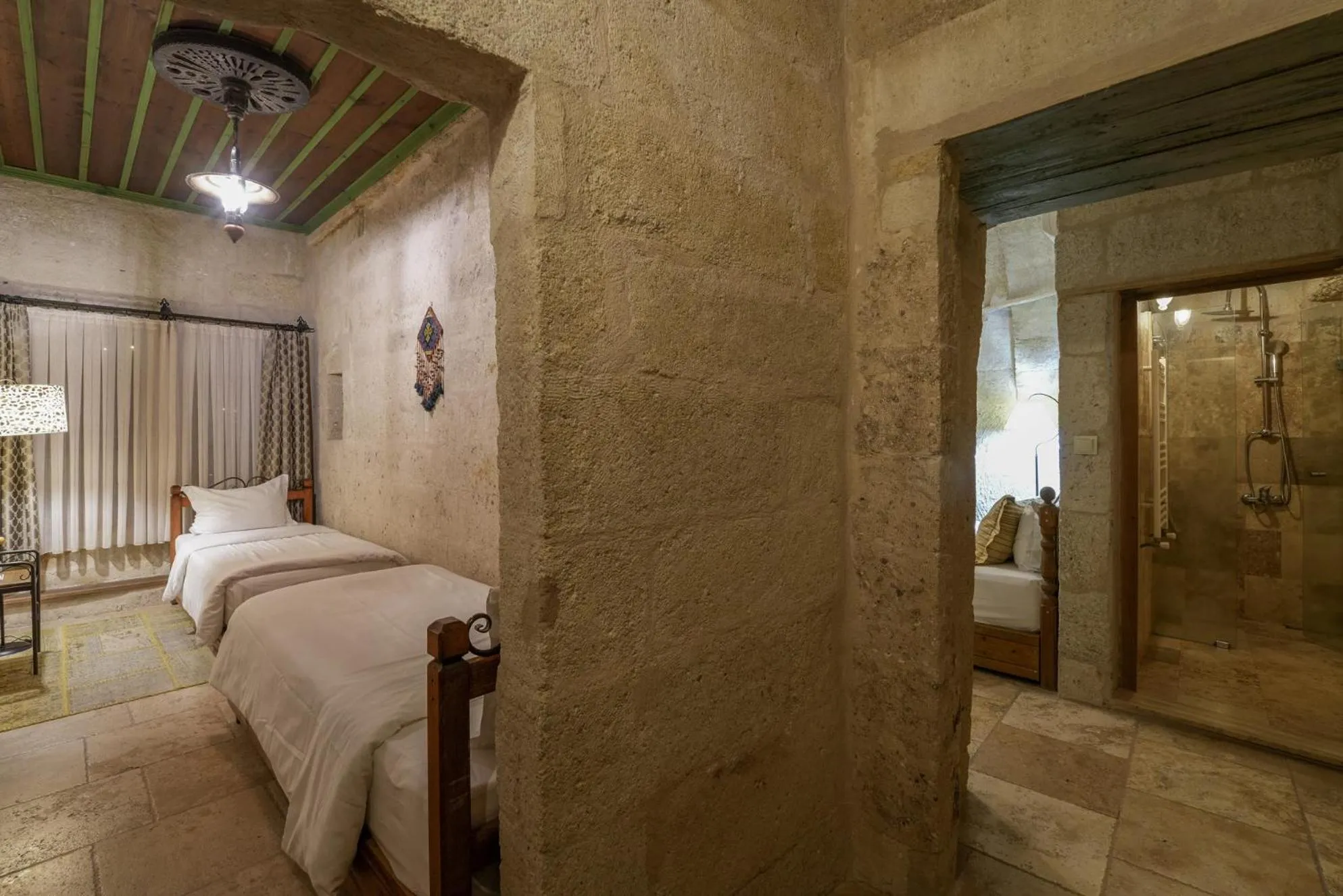 Bed in Tekkaya Cave Hotel