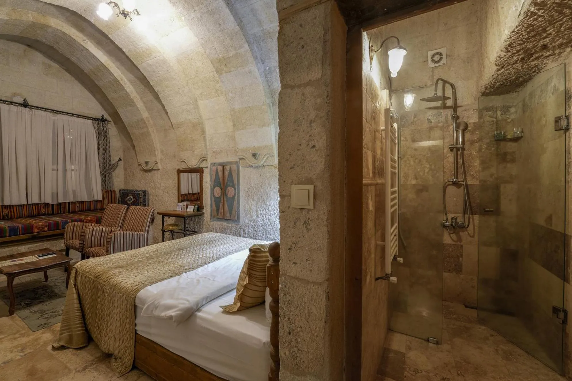Bed in Tekkaya Cave Hotel
