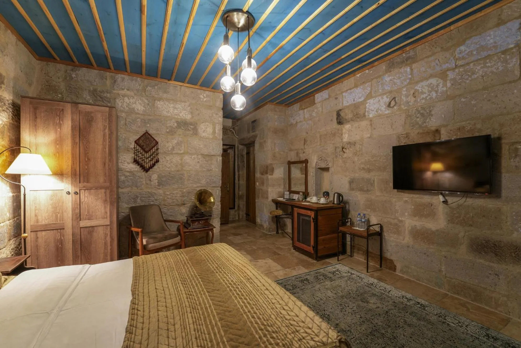 Bed in Tekkaya Cave Hotel