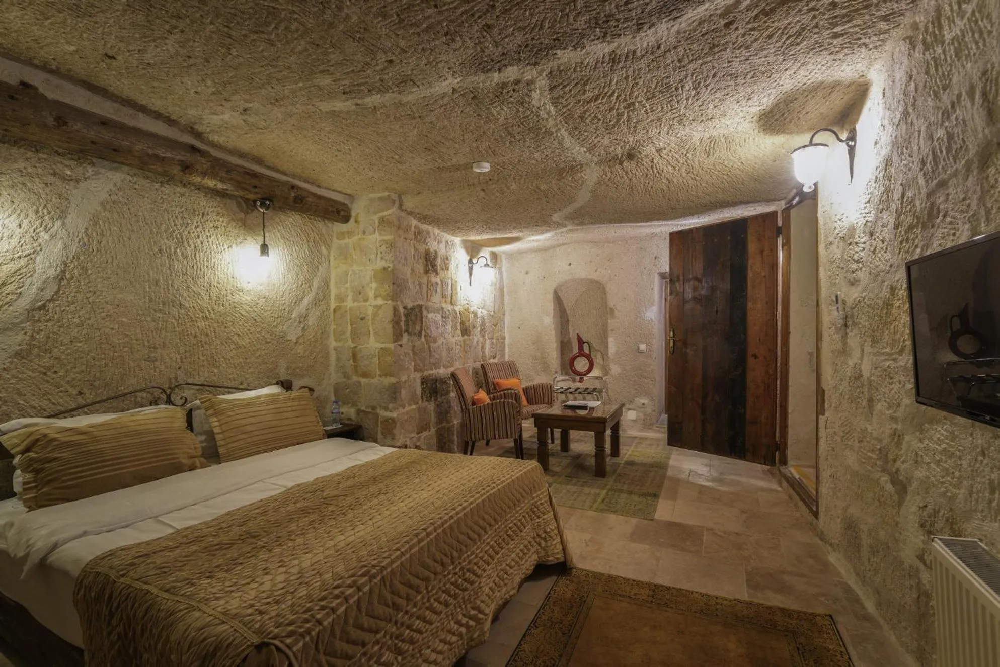 Bed in Tekkaya Cave Hotel