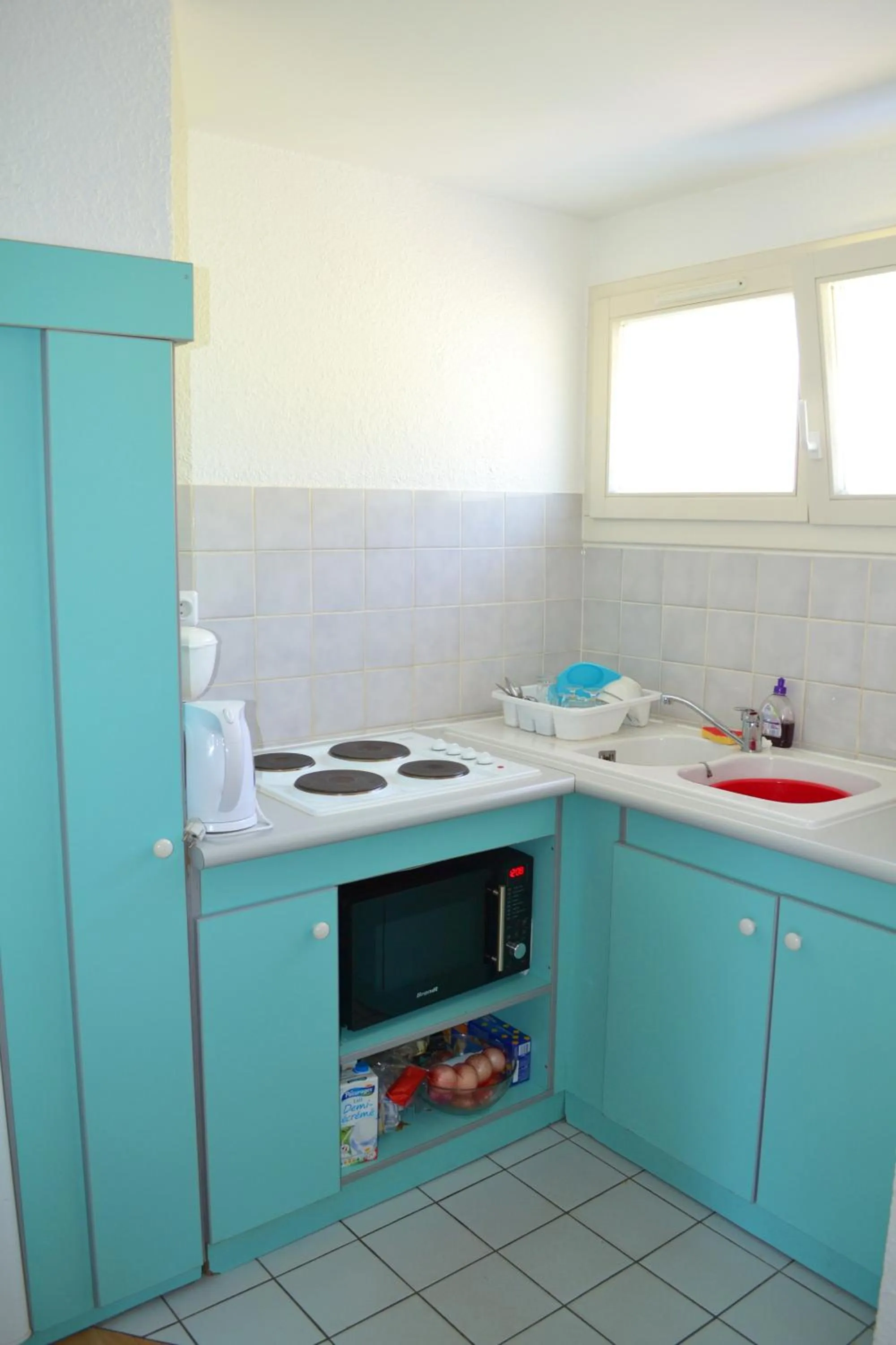 Kitchen or kitchenette in VVF Les Fontaines des Vosges