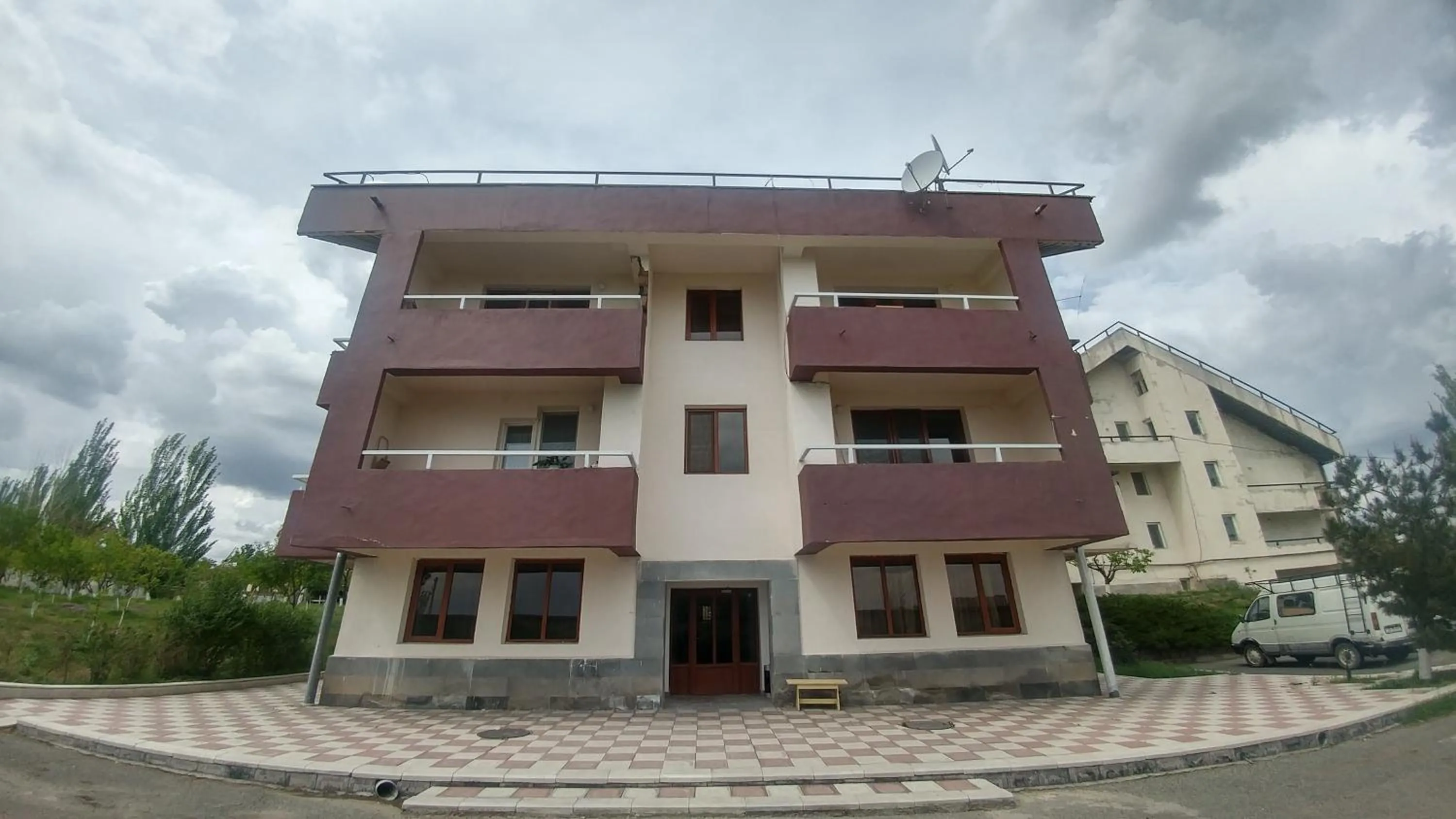 Property building in Cross Apartments and Tours