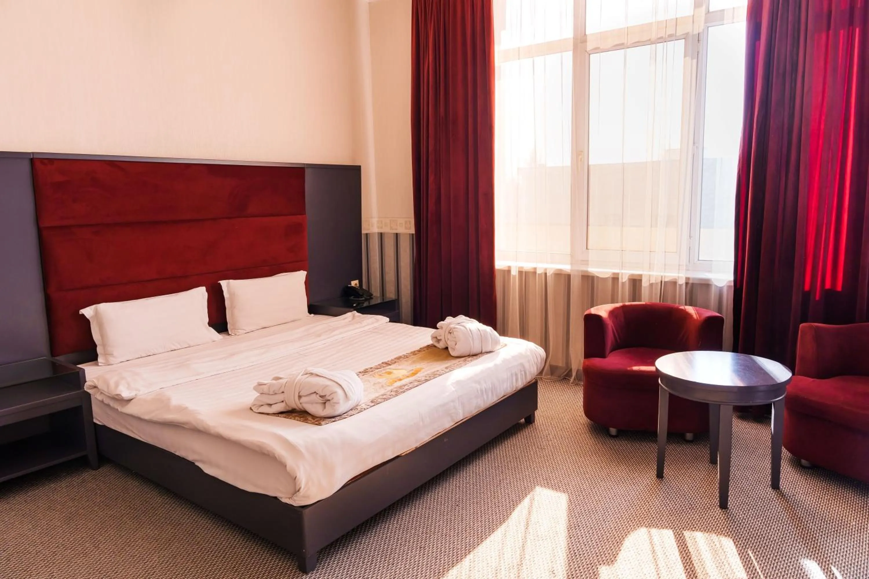 Photo of the whole room, Bed in Almaty Grand Erbil Hotel