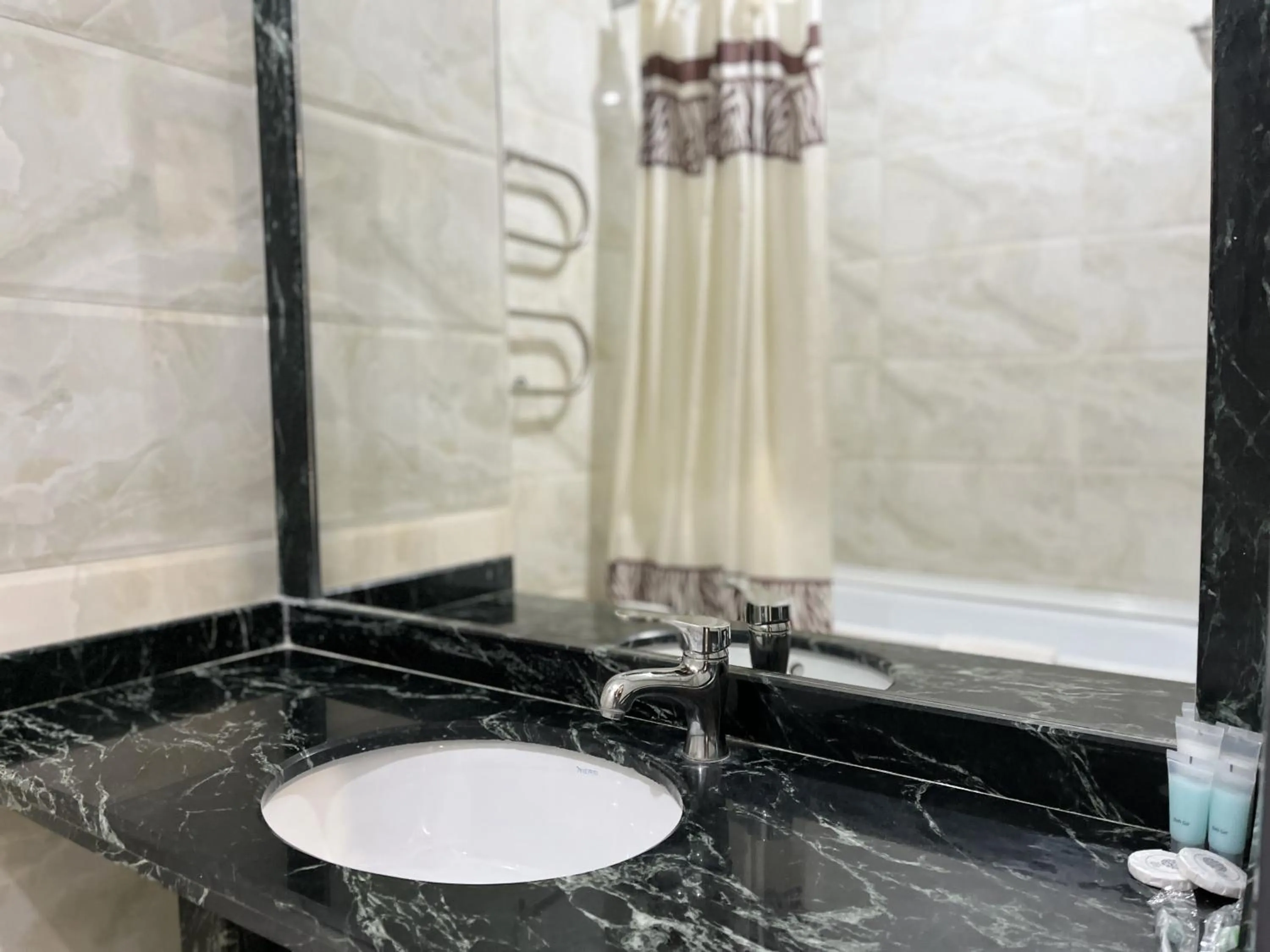 Bathroom in Almaty Grand Erbil Hotel