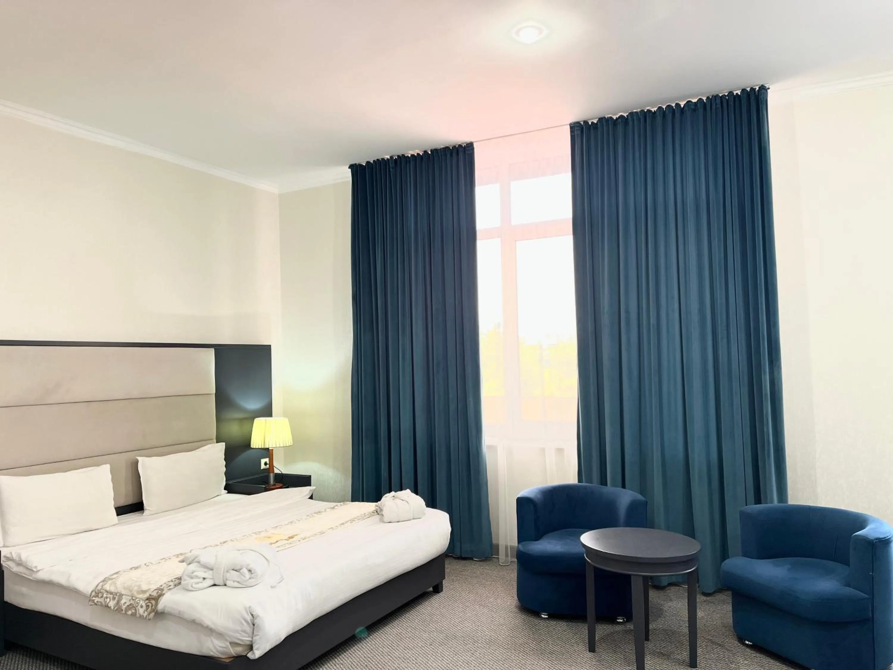 Photo of the whole room, Bed in Almaty Grand Erbil Hotel