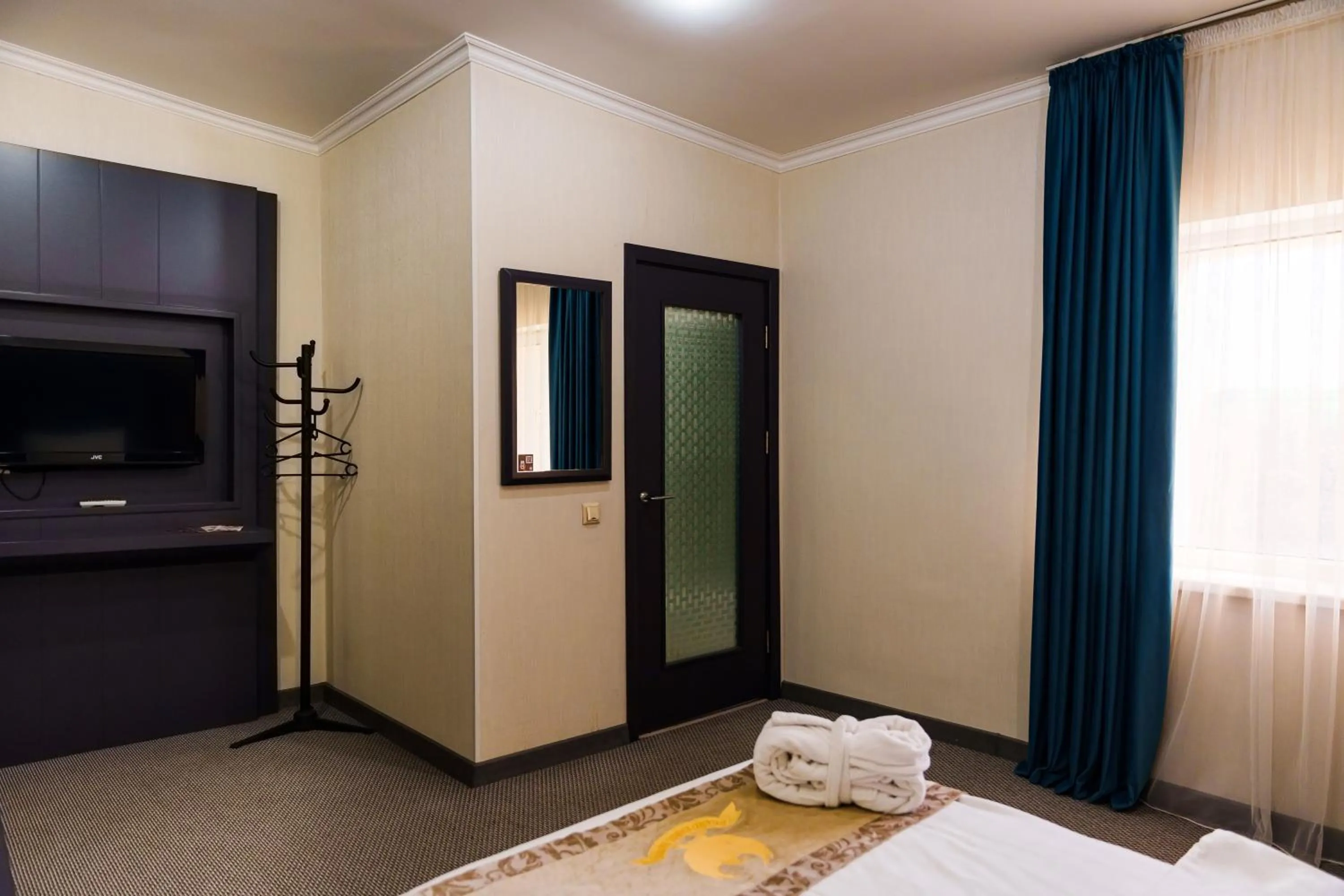 Photo of the whole room, Bed in Almaty Grand Erbil Hotel