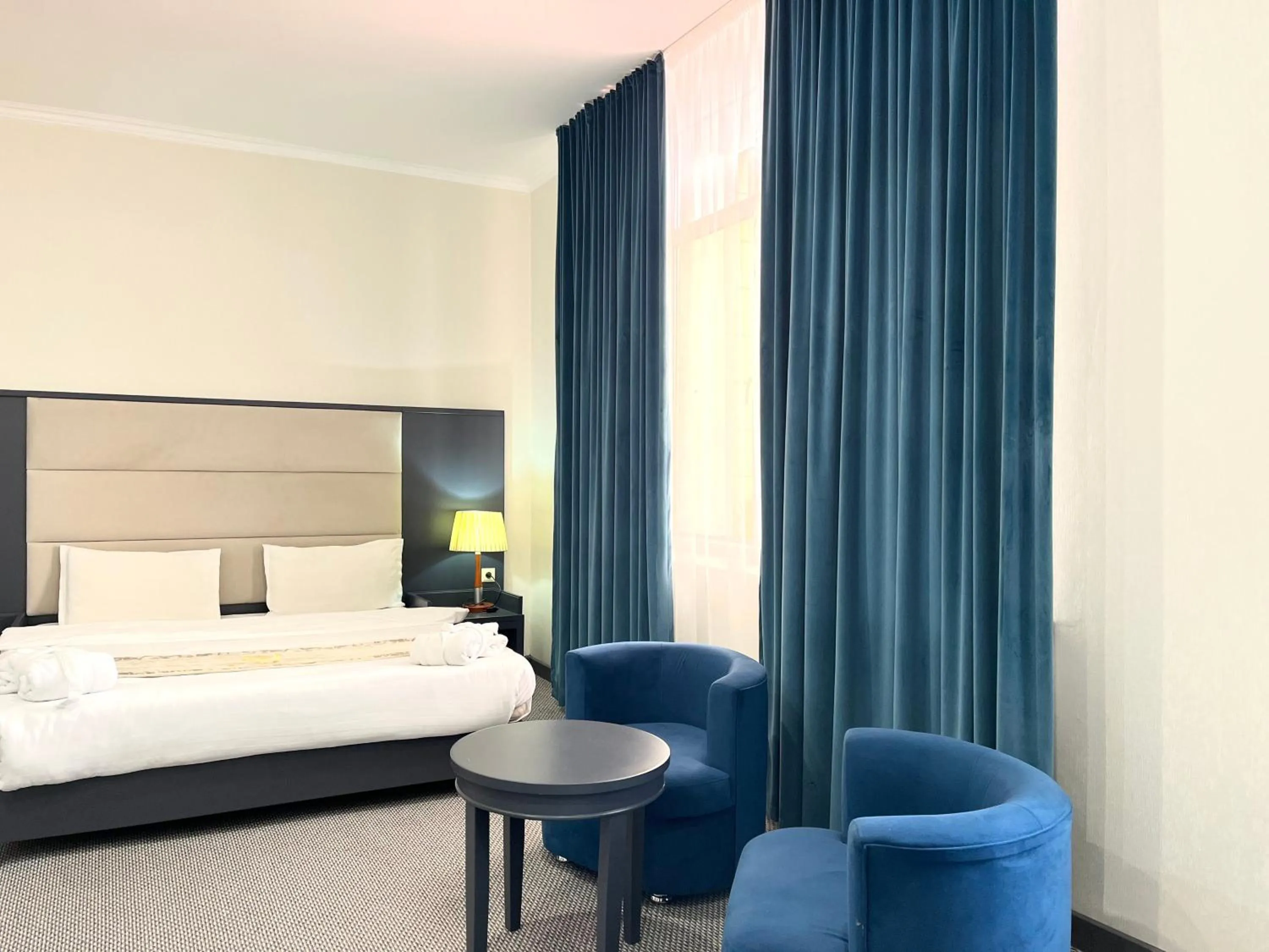 Photo of the whole room, Bed in Almaty Grand Erbil Hotel