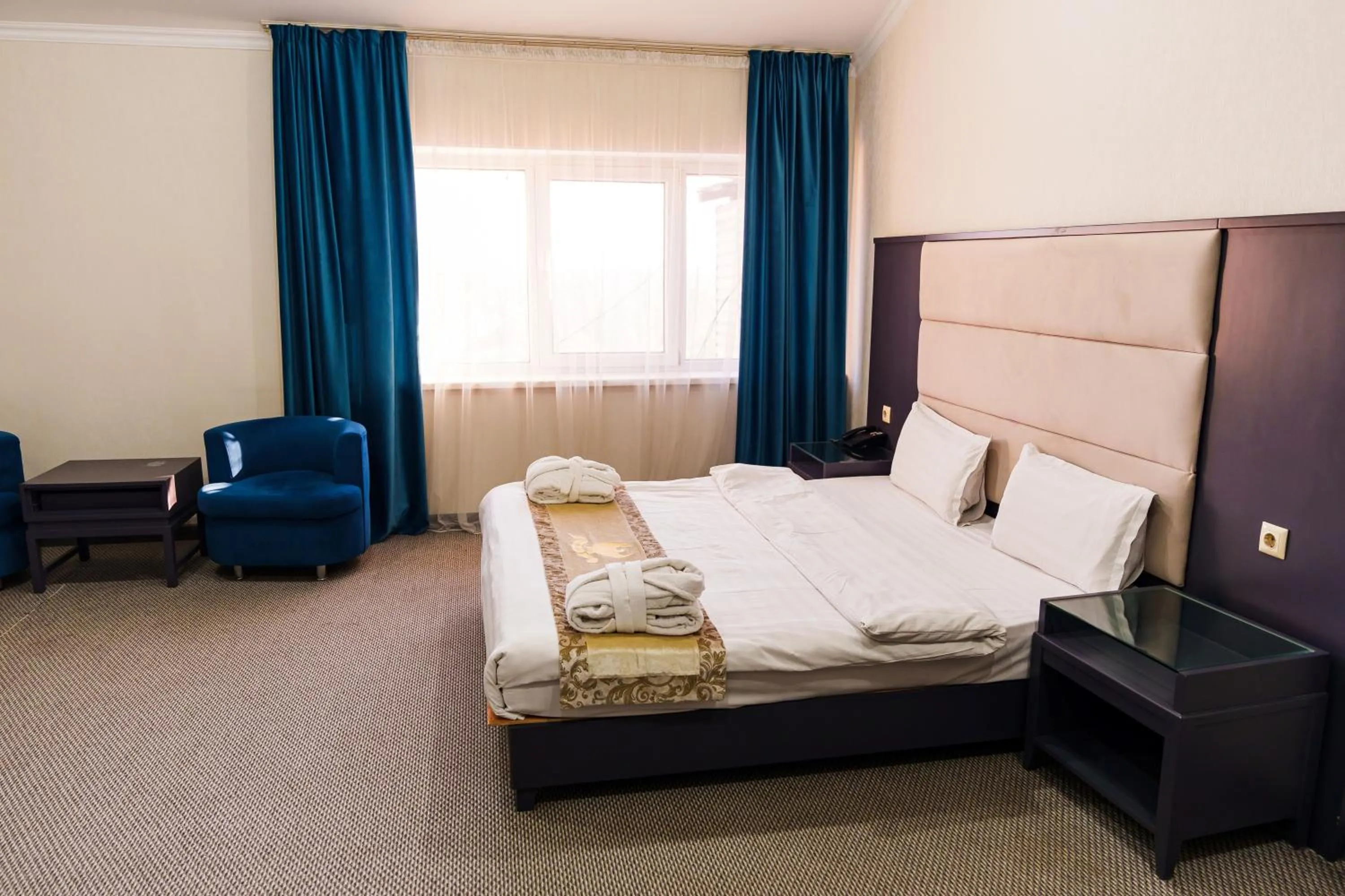 Photo of the whole room, Bed in Almaty Grand Erbil Hotel