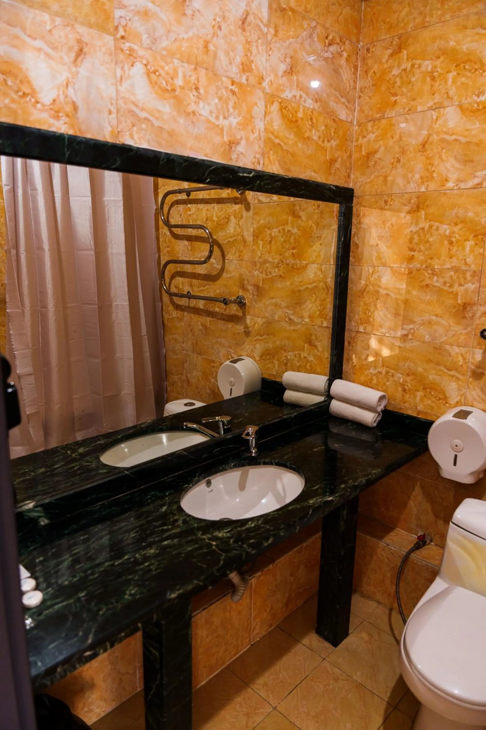 Bathroom in Almaty Grand Erbil Hotel