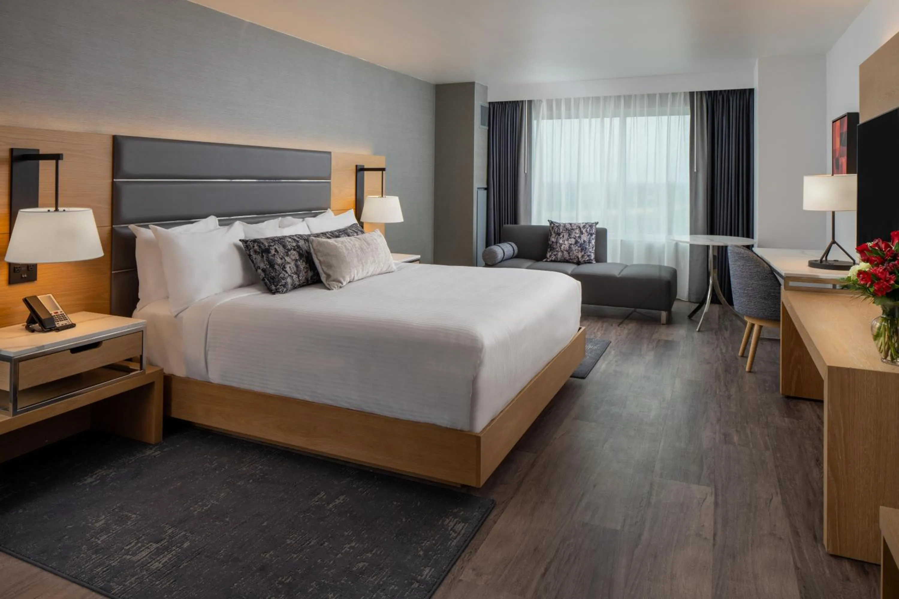 Living room, Bed in Live Casino & Hotel Louisiana, Curio Collection by Hilton