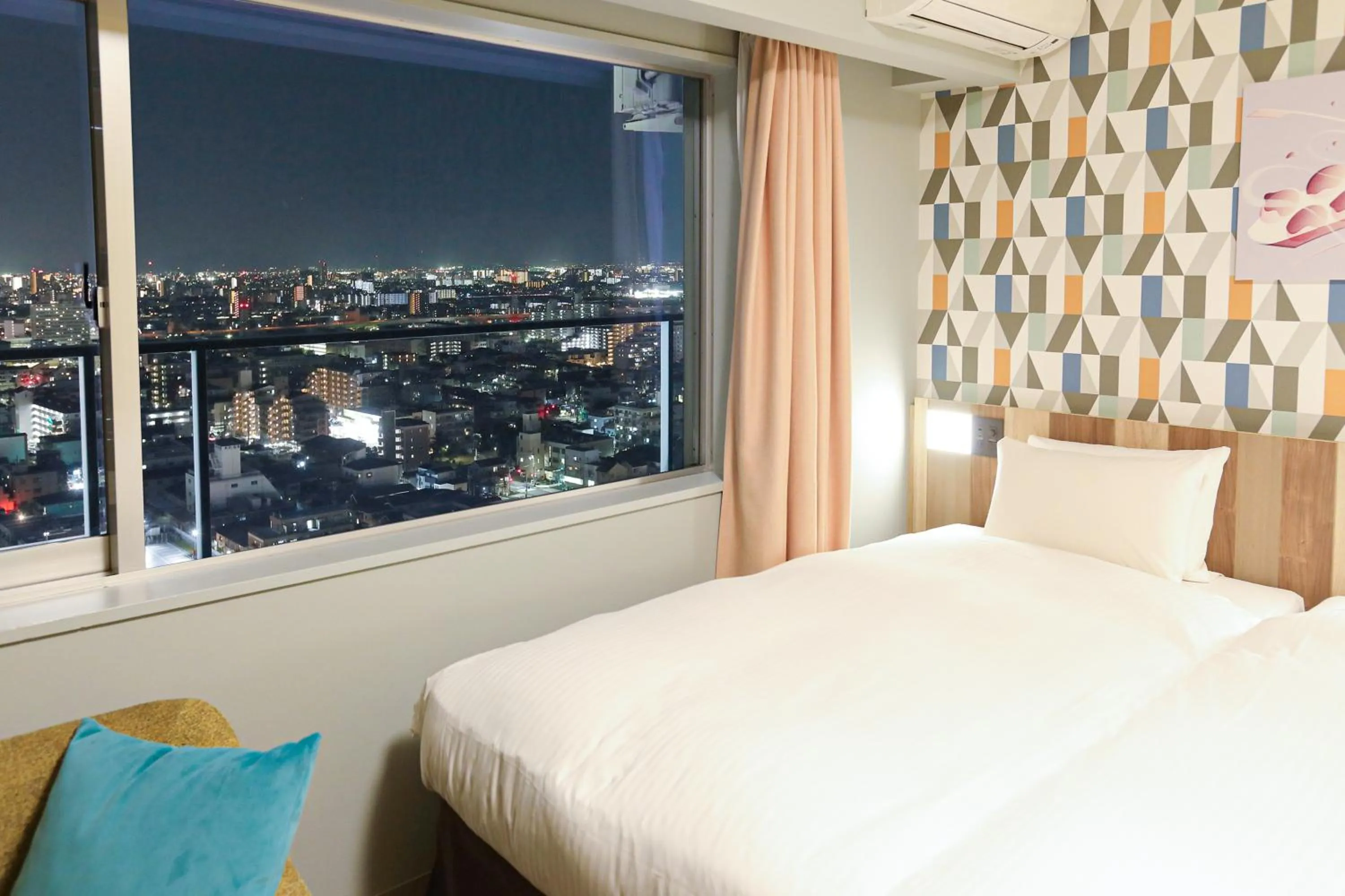 Bedroom, Bed in Hiyori Hotel Osaka Suminoekoen Station