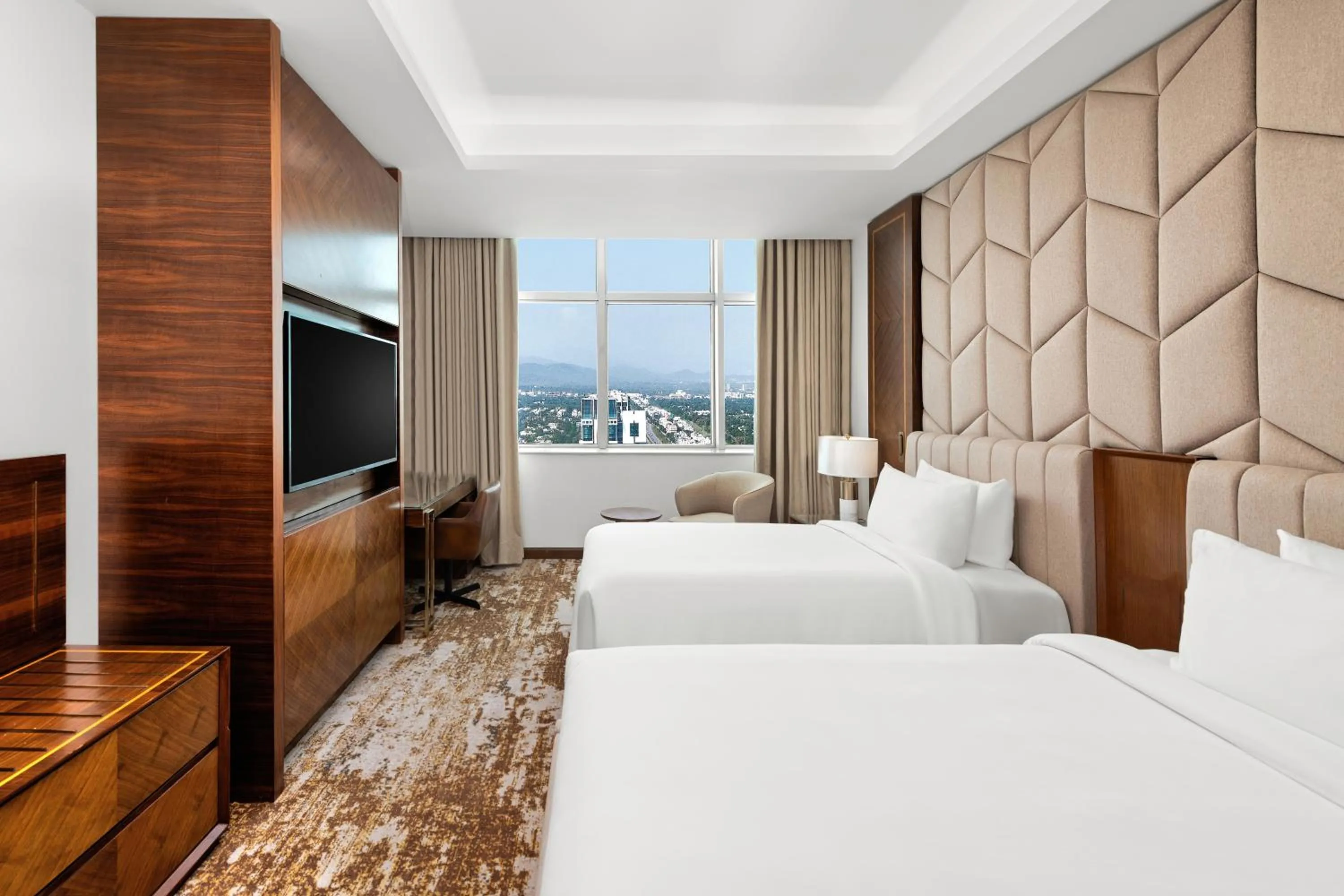 Bed in Movenpick Hotel Centaurus Islamabad