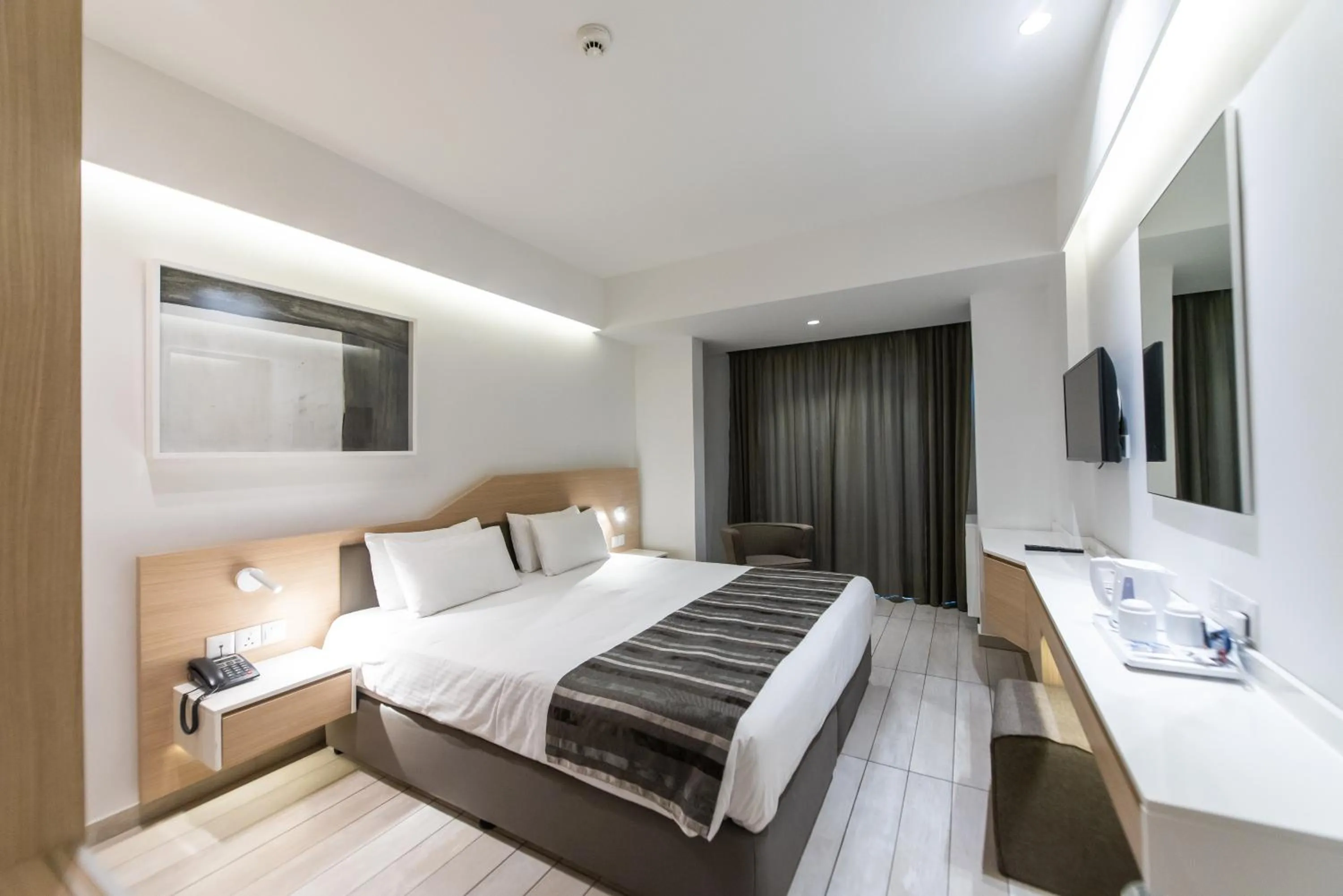 Bedroom in Evalena Beach Hotel