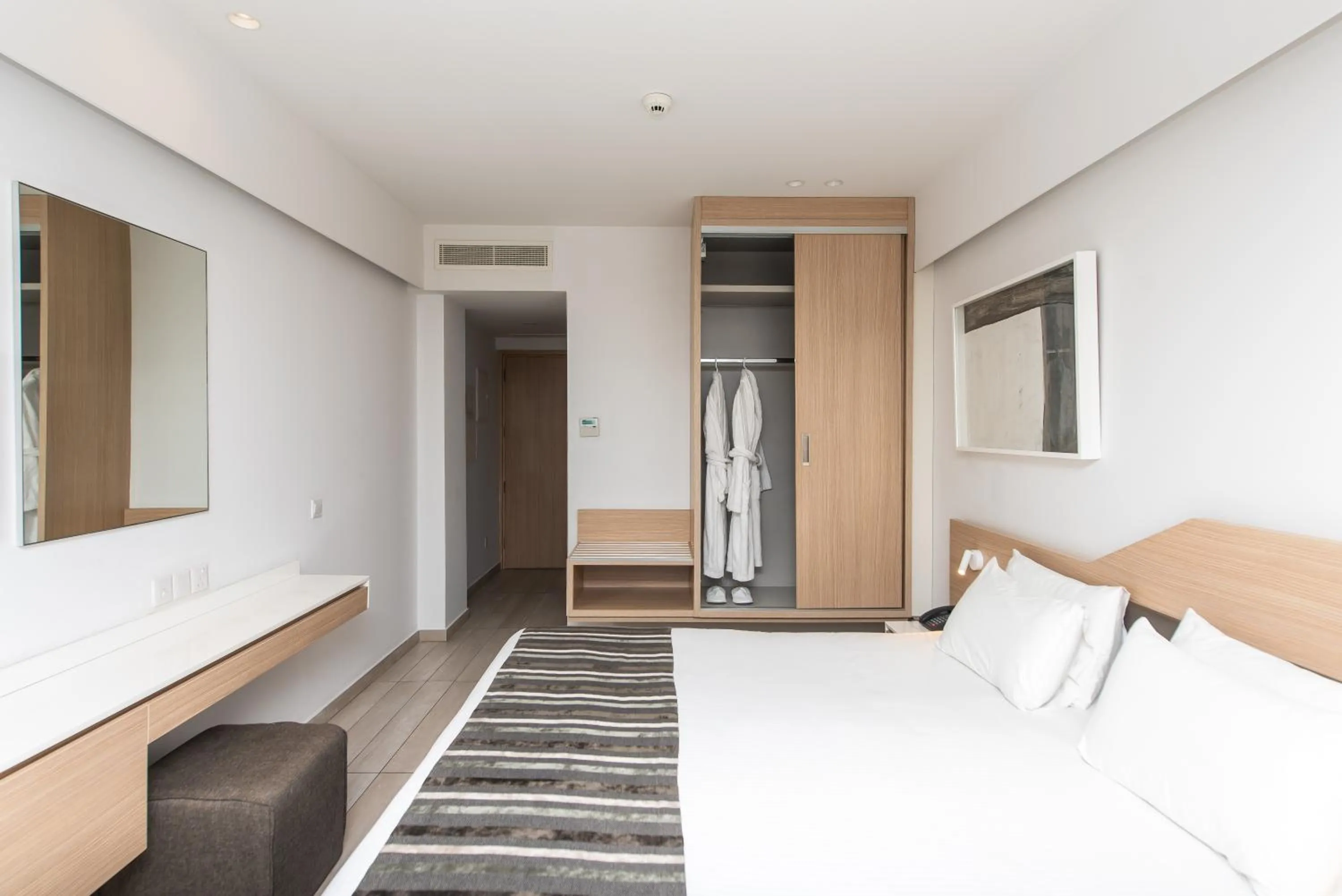 Bedroom in Evalena Beach Hotel