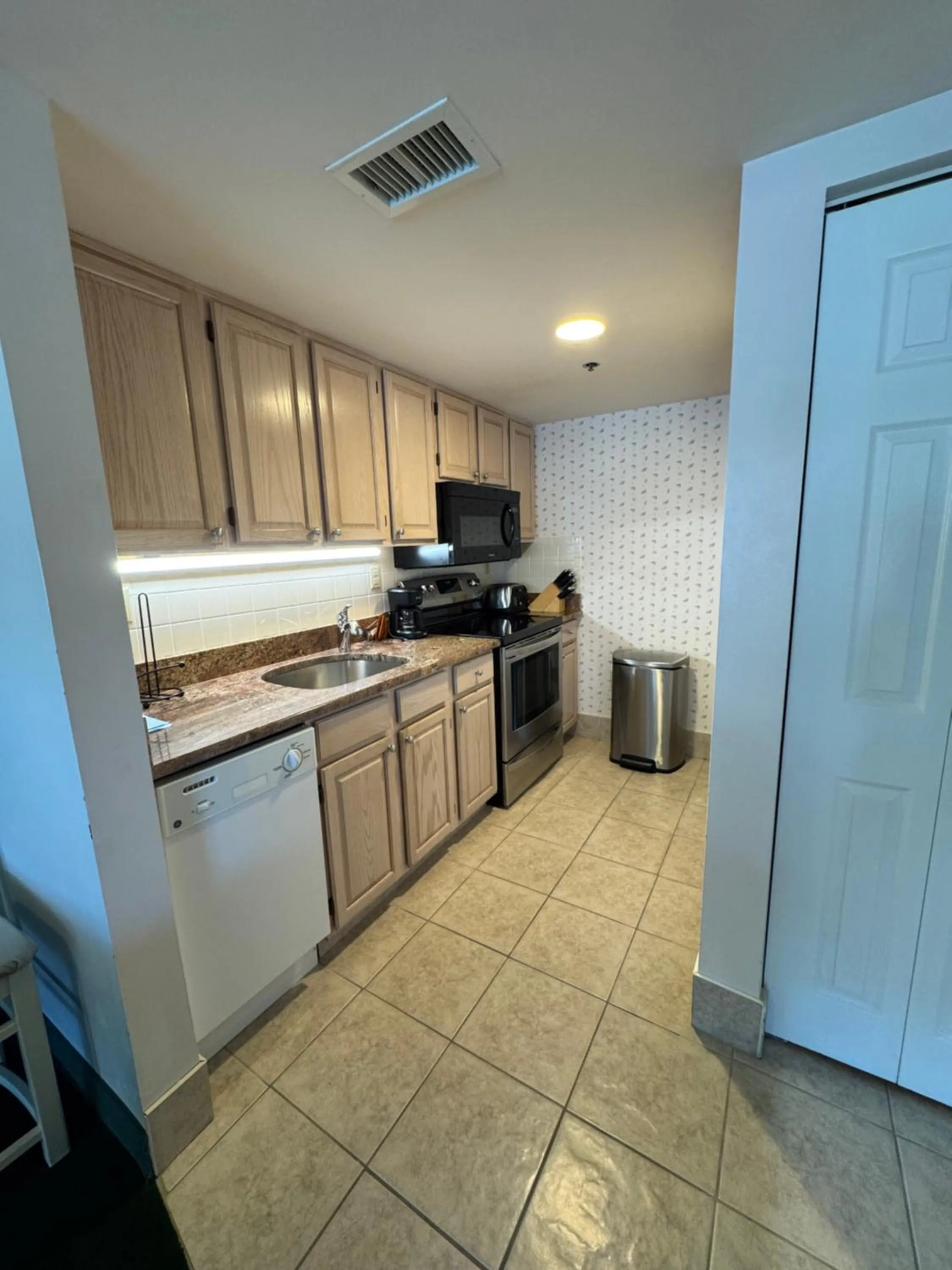kitchen in Watson's Regency Suites