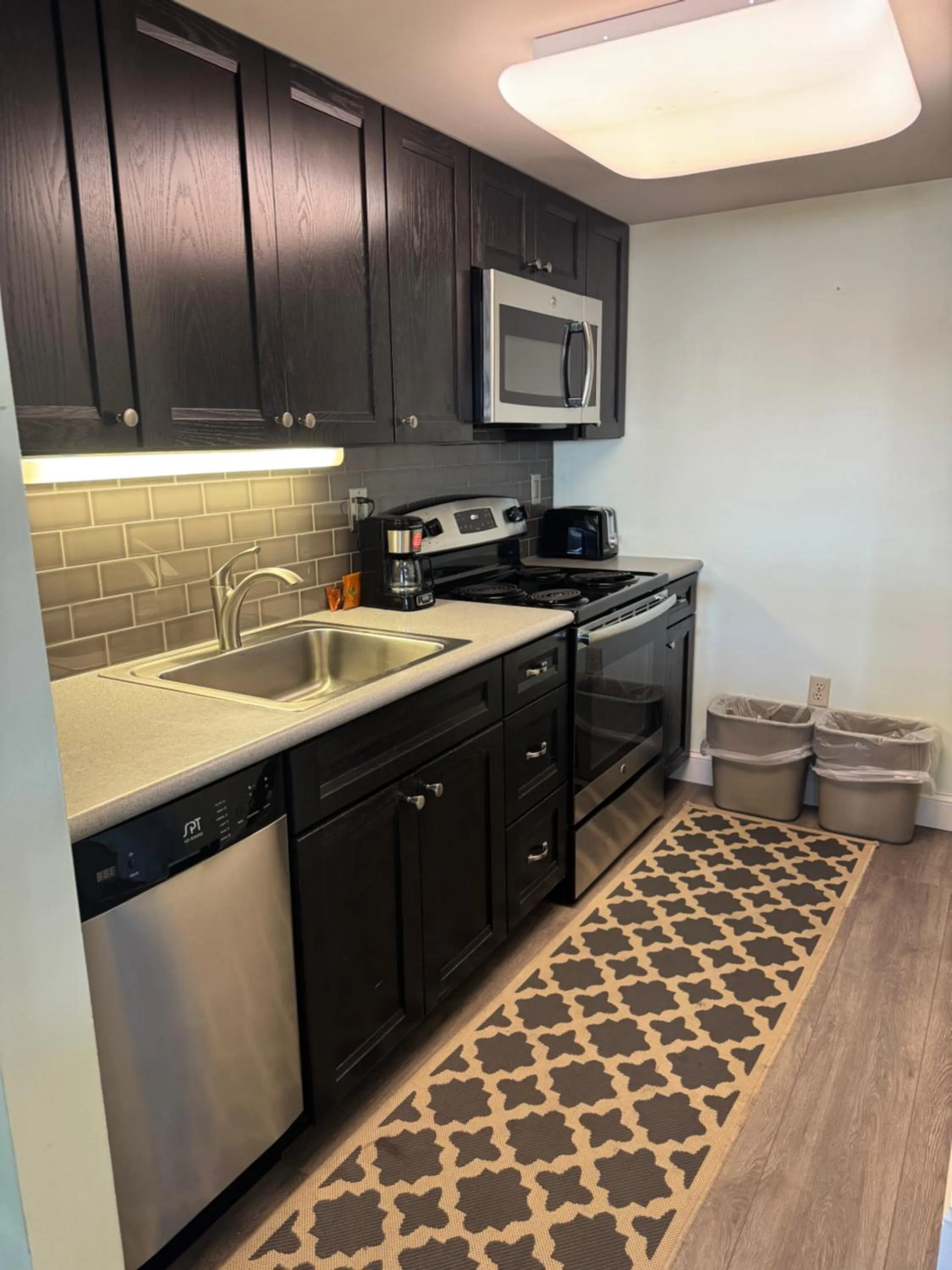 kitchen in Watson's Regency Suites
