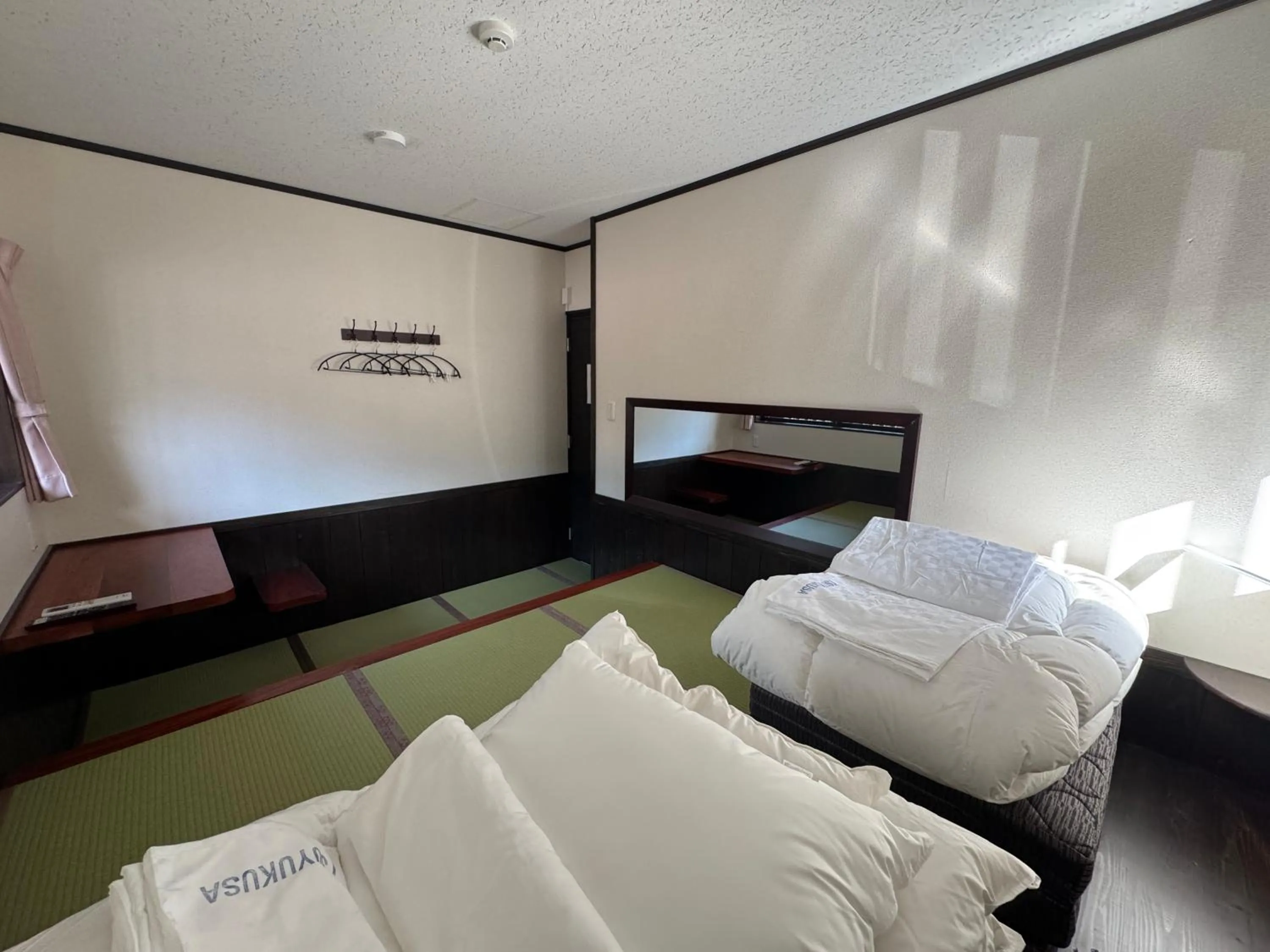 Bed in Tsuyukusa